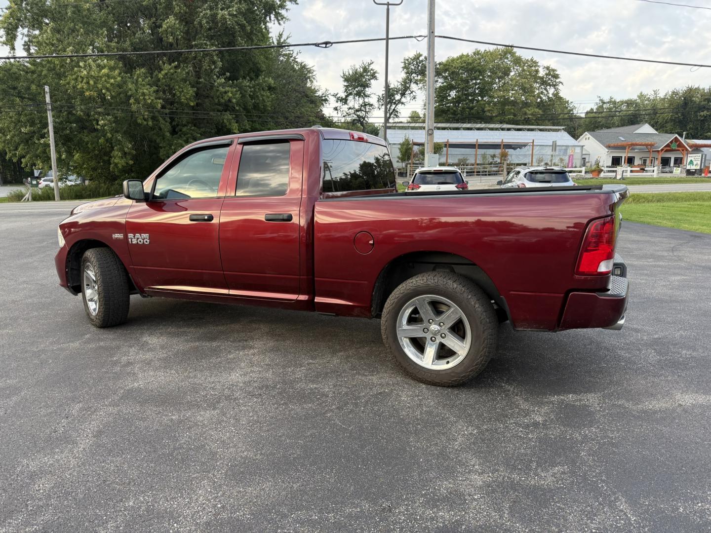2016 Red /Black RAM 1500 Express Quad Cab 4WD (1C6RR7FT7GS) with an 5.7L V8 OHV 16V engine, Automatic transmission, located at 11115 Chardon Rd. , Chardon, OH, 44024, (440) 214-9705, 41.580246, -81.241943 - 2016 Ram 1500 Express Quad Cab 4WD – HEMI Power with Fresh Brakes and Solid Towing Capability If you need a full-size truck that is straightforward, capable, and ready to work, this 2016 Ram 1500 Express Quad Cab 4WD is a strong option. The 5.7L HEMI V8 and 8-speed automatic deliver dependable po- Photo#30