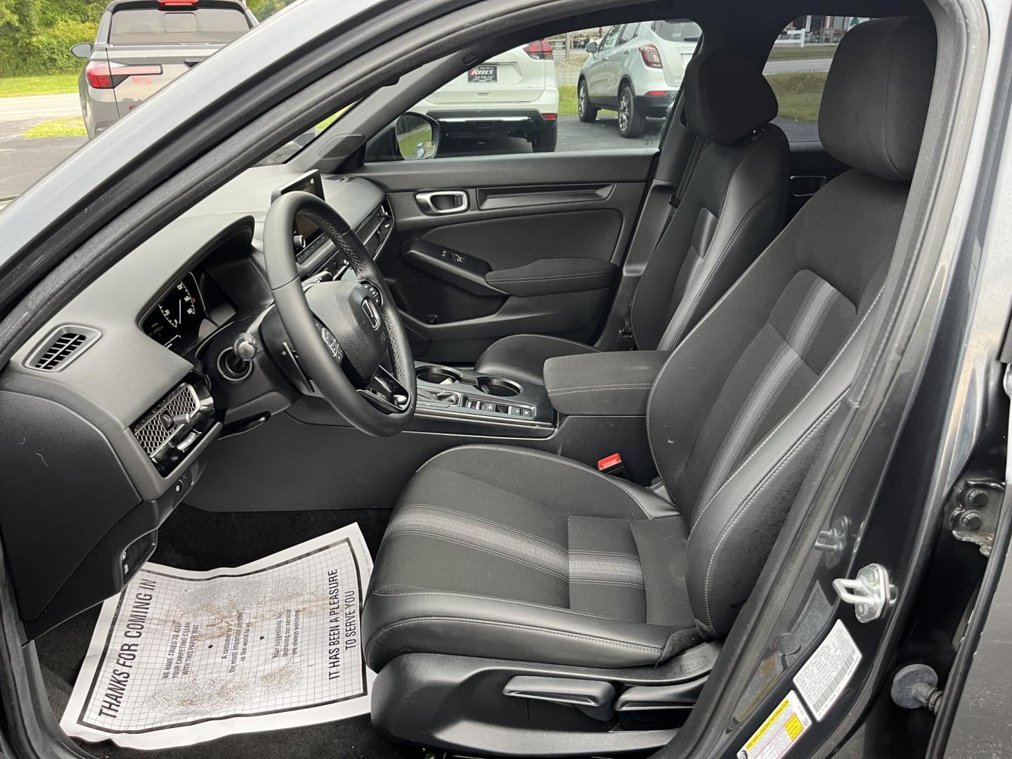 2024 Gray /Black Honda Civic Sport (2HGFE2F51RH) with an 2.0L I4 DOHC 16V engine, Automatc transmission, located at 11115 Chardon Rd. , Chardon, OH, 44024, (440) 214-9705, 41.580246, -81.241943 - 2024 Honda Civic Sport Sedan – Efficient, Current, and Easy to Live With If you want a compact sedan that feels new, efficient, and well equipped, this 2024 Honda Civic Sport is a strong option. The 2.0L engine delivers smooth everyday power and an impressive 40 MPG highway rating, while Sport an- Photo#18
