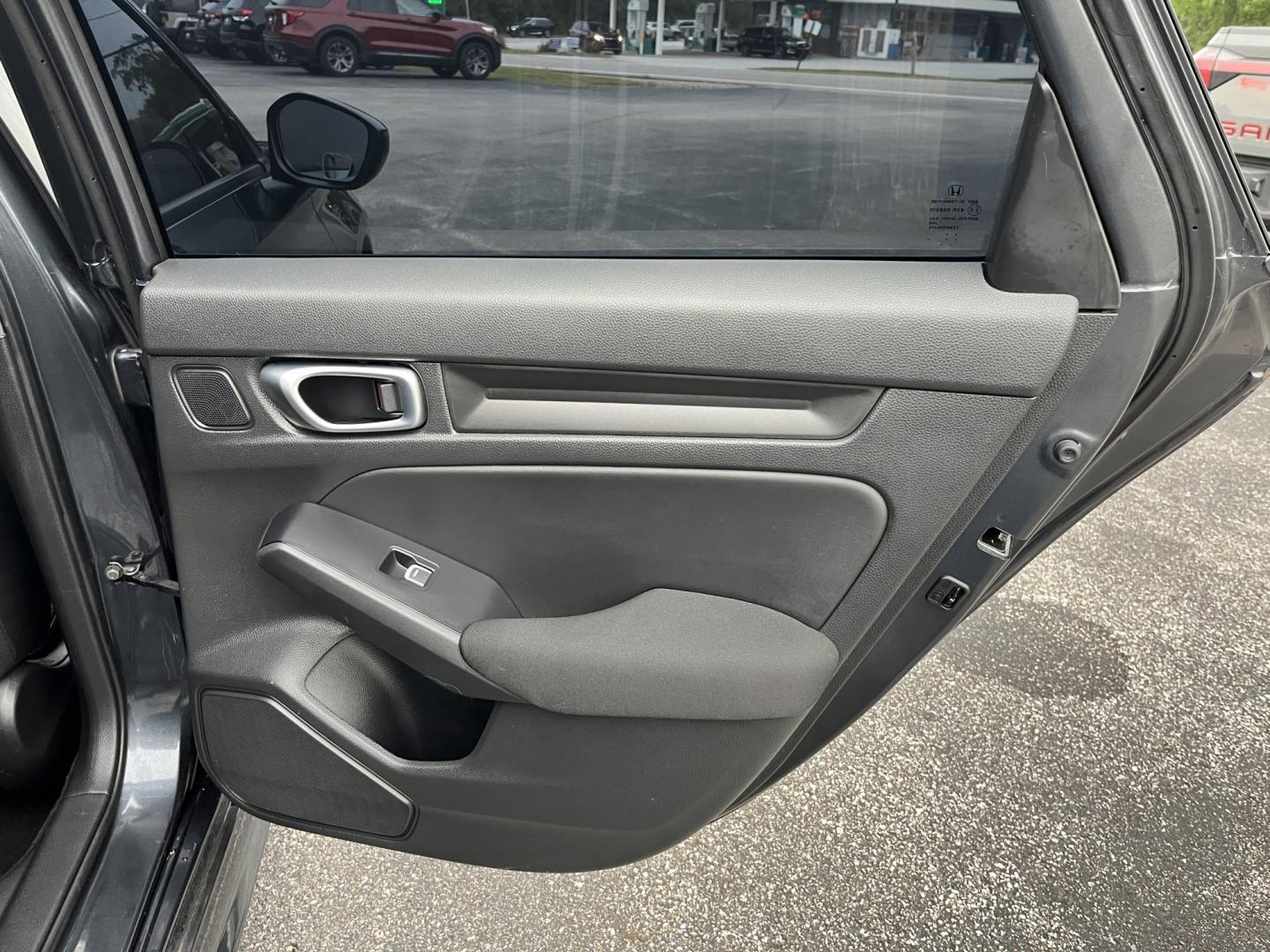 2024 Gray /Black Honda Civic Sport (2HGFE2F51RH) with an 2.0L I4 DOHC 16V engine, Automatc transmission, located at 11115 Chardon Rd. , Chardon, OH, 44024, (440) 214-9705, 41.580246, -81.241943 - 2024 Honda Civic Sport Sedan – Efficient, Current, and Easy to Live With If you want a compact sedan that feels new, efficient, and well equipped, this 2024 Honda Civic Sport is a strong option. The 2.0L engine delivers smooth everyday power and an impressive 40 MPG highway rating, while Sport an- Photo#30