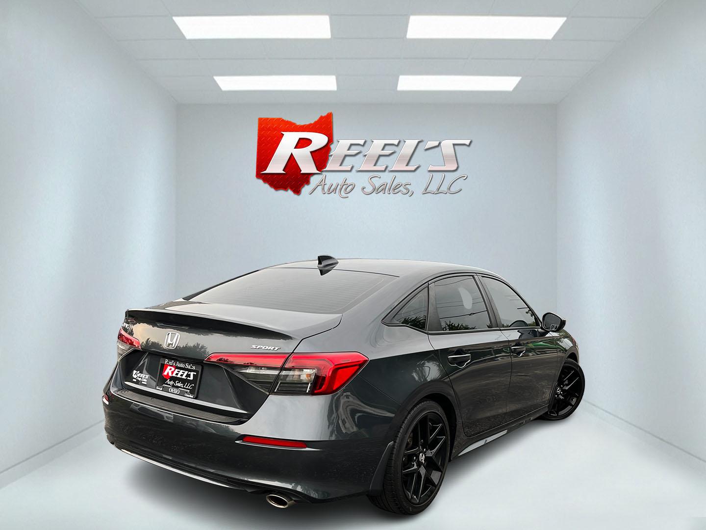2024 Gray /Black Honda Civic Sport (2HGFE2F51RH) with an 2.0L I4 DOHC 16V engine, Automatc transmission, located at 11115 Chardon Rd. , Chardon, OH, 44024, (440) 214-9705, 41.580246, -81.241943 - 2024 Honda Civic Sport Sedan – Efficient, Current, and Easy to Live With If you want a compact sedan that feels new, efficient, and well equipped, this 2024 Honda Civic Sport is a strong option. The 2.0L engine delivers smooth everyday power and an impressive 40 MPG highway rating, while Sport an- Photo#7