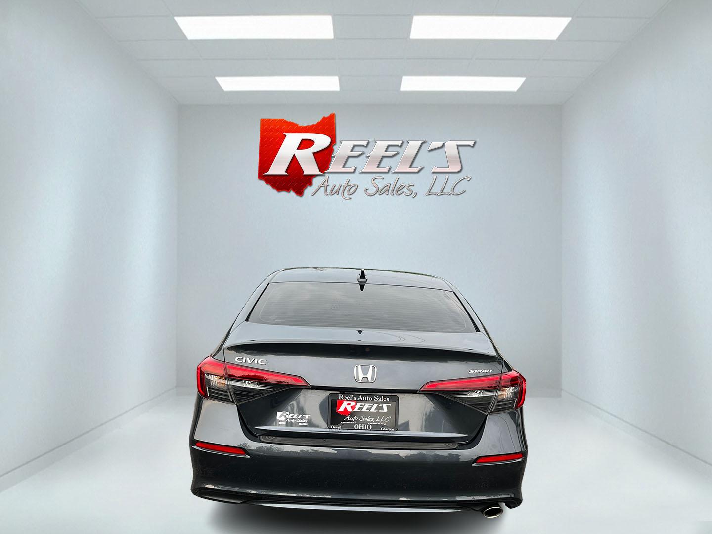 2024 Gray /Black Honda Civic Sport (2HGFE2F51RH) with an 2.0L I4 DOHC 16V engine, Automatc transmission, located at 11115 Chardon Rd. , Chardon, OH, 44024, (440) 214-9705, 41.580246, -81.241943 - 2024 Honda Civic Sport Sedan – Efficient, Current, and Easy to Live With If you want a compact sedan that feels new, efficient, and well equipped, this 2024 Honda Civic Sport is a strong option. The 2.0L engine delivers smooth everyday power and an impressive 40 MPG highway rating, while Sport an- Photo#9