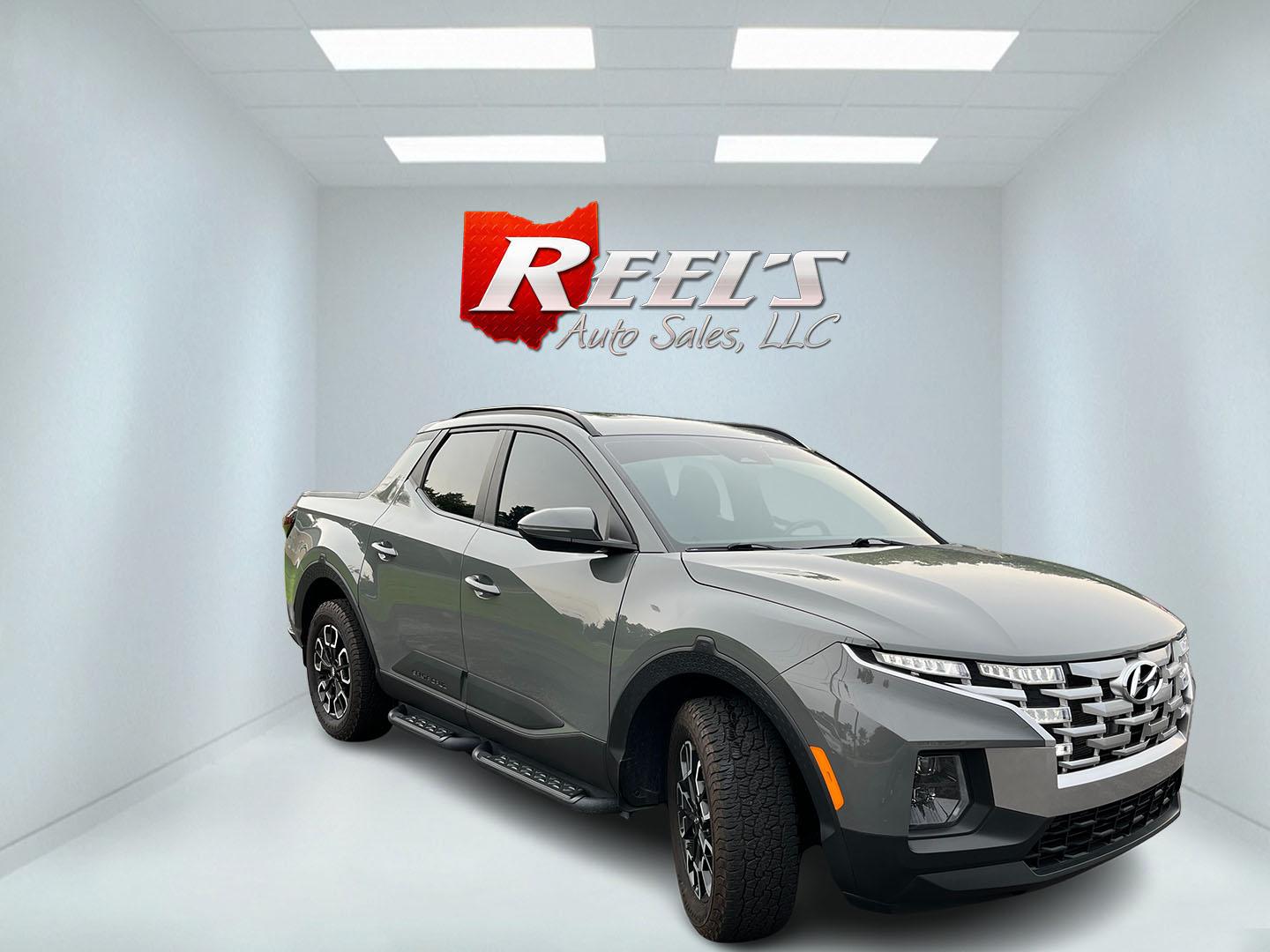 2022 Gray /Black Hyundai Santa Cruz SEL Premium AWD (5NTJDDAF7NH) with an 2.5L I4 DOHC 16V Turbo engine, Automatc transmission, located at 11115 Chardon Rd. , Chardon, OH, 44024, (440) 214-9705, 41.580246, -81.241943 - 2022 Hyundai Santa Cruz SEL Premium AWD – Compact Truck Convenience with Modern Features If you want the usefulness of a truck bed without the size of a full-size pickup, this 2022 Hyundai Santa Cruz SEL Premium AWD is a practical choice. The 2.5L Turbocharged engine and 8-speed automatic deliver- Photo#3