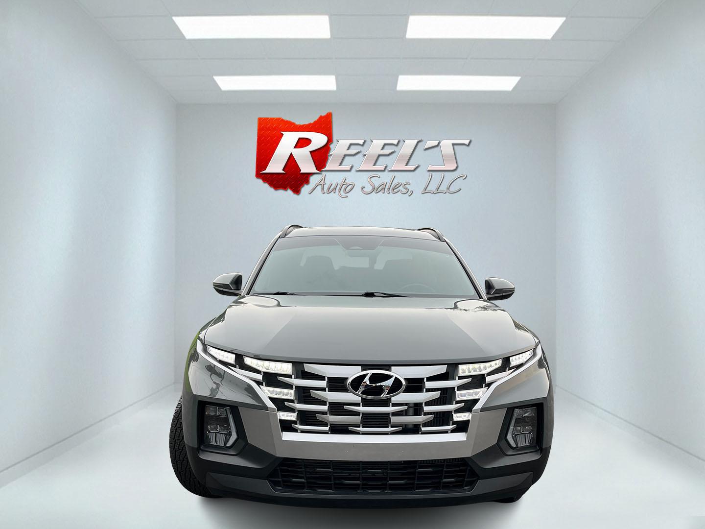 2022 Gray /Black Hyundai Santa Cruz SEL Premium AWD (5NTJDDAF7NH) with an 2.5L I4 DOHC 16V Turbo engine, Automatc transmission, located at 11115 Chardon Rd. , Chardon, OH, 44024, (440) 214-9705, 41.580246, -81.241943 - 2022 Hyundai Santa Cruz SEL Premium AWD – Compact Truck Convenience with Modern Features If you want the usefulness of a truck bed without the size of a full-size pickup, this 2022 Hyundai Santa Cruz SEL Premium AWD is a practical choice. The 2.5L Turbocharged engine and 8-speed automatic deliver- Photo#2