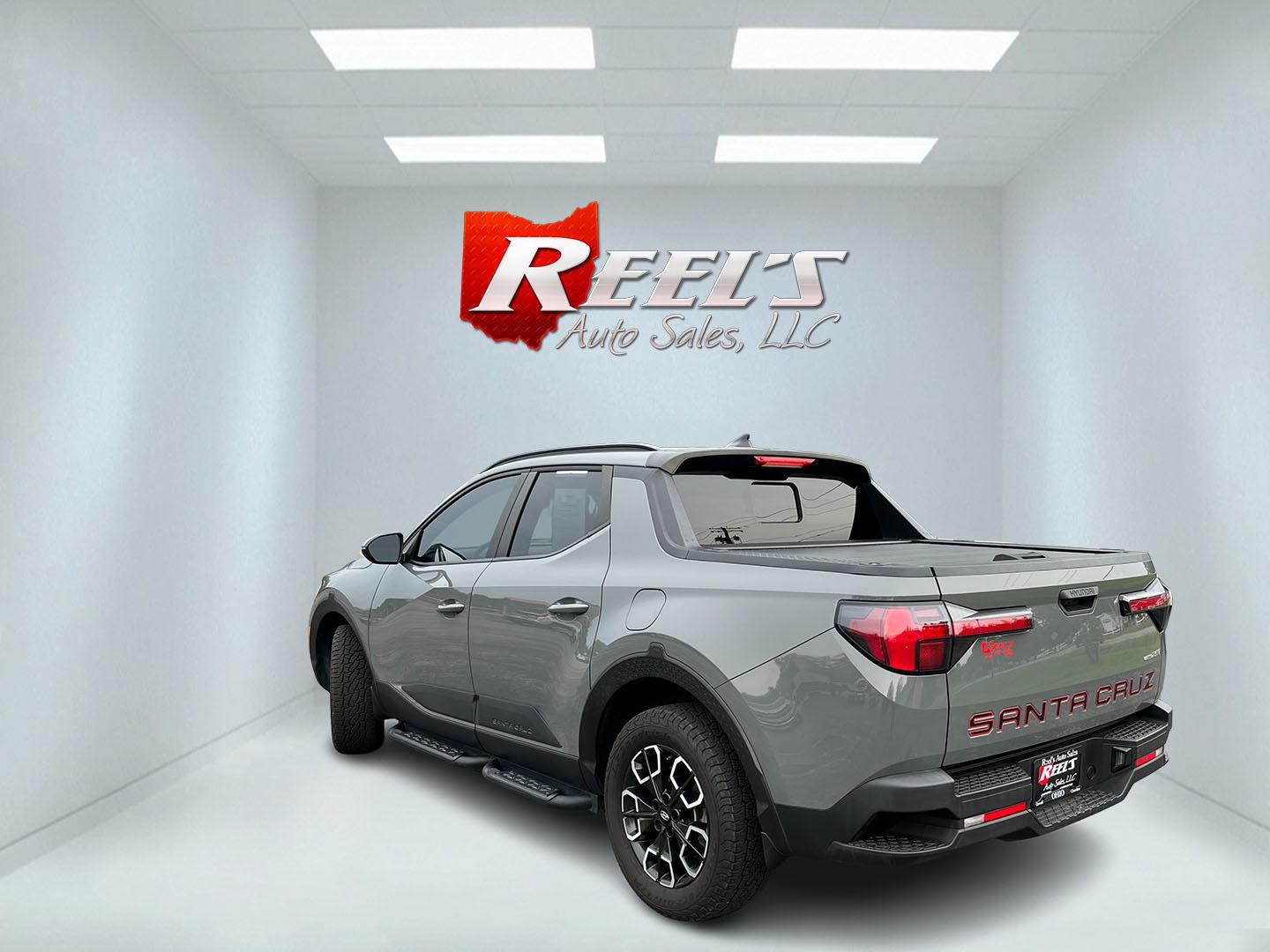 2022 Gray /Black Hyundai Santa Cruz SEL Premium AWD (5NTJDDAF7NH) with an 2.5L I4 DOHC 16V Turbo engine, Automatc transmission, located at 11115 Chardon Rd. , Chardon, OH, 44024, (440) 214-9705, 41.580246, -81.241943 - 2022 Hyundai Santa Cruz SEL Premium AWD – Compact Truck Convenience with Modern Features If you want the usefulness of a truck bed without the size of a full-size pickup, this 2022 Hyundai Santa Cruz SEL Premium AWD is a practical choice. The 2.5L Turbocharged engine and 8-speed automatic deliver- Photo#10