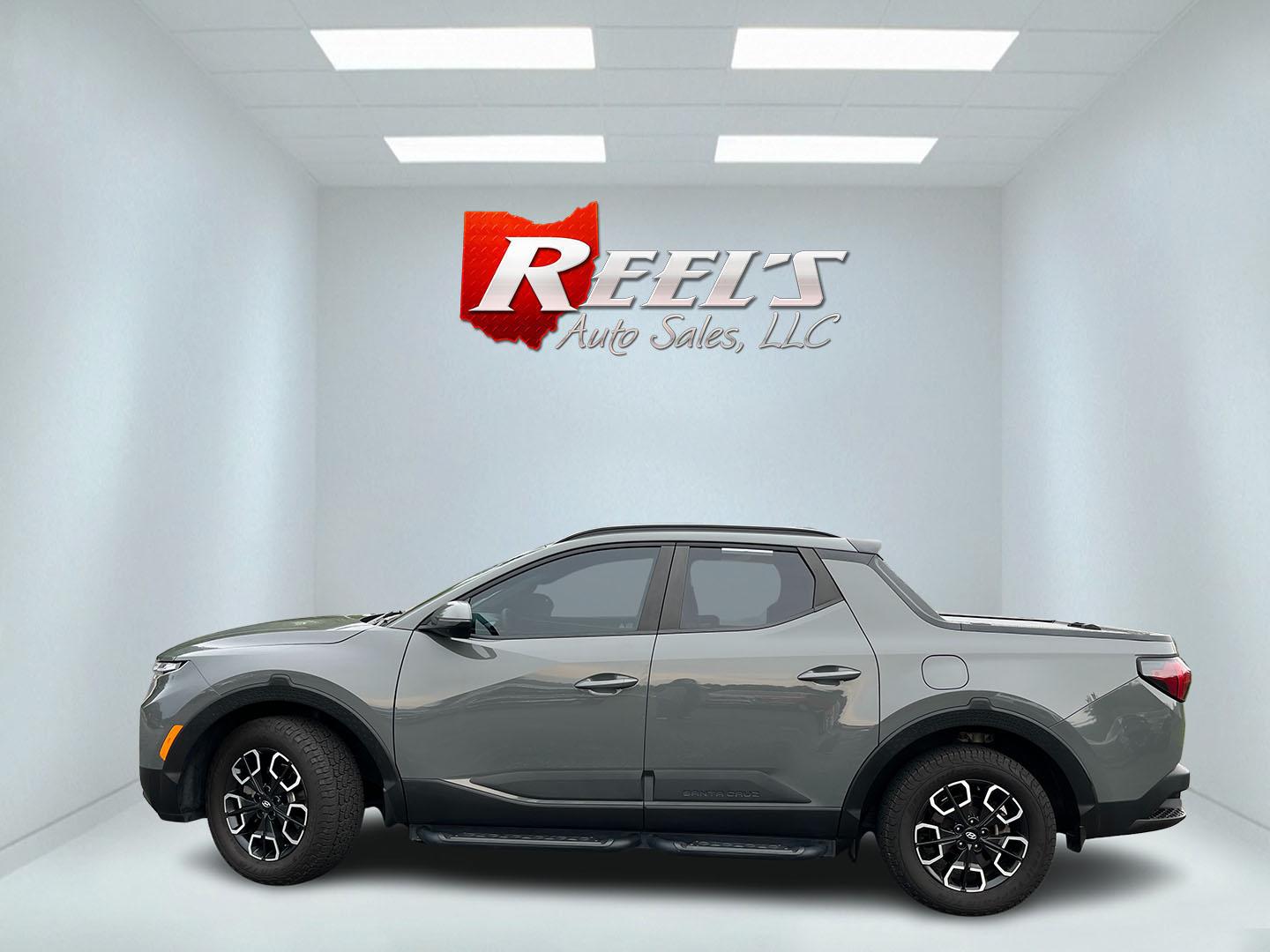 2022 Gray /Black Hyundai Santa Cruz SEL Premium AWD (5NTJDDAF7NH) with an 2.5L I4 DOHC 16V Turbo engine, Automatc transmission, located at 11115 Chardon Rd. , Chardon, OH, 44024, (440) 214-9705, 41.580246, -81.241943 - 2022 Hyundai Santa Cruz SEL Premium AWD – Compact Truck Convenience with Modern Features If you want the usefulness of a truck bed without the size of a full-size pickup, this 2022 Hyundai Santa Cruz SEL Premium AWD is a practical choice. The 2.5L Turbocharged engine and 8-speed automatic deliver- Photo#12