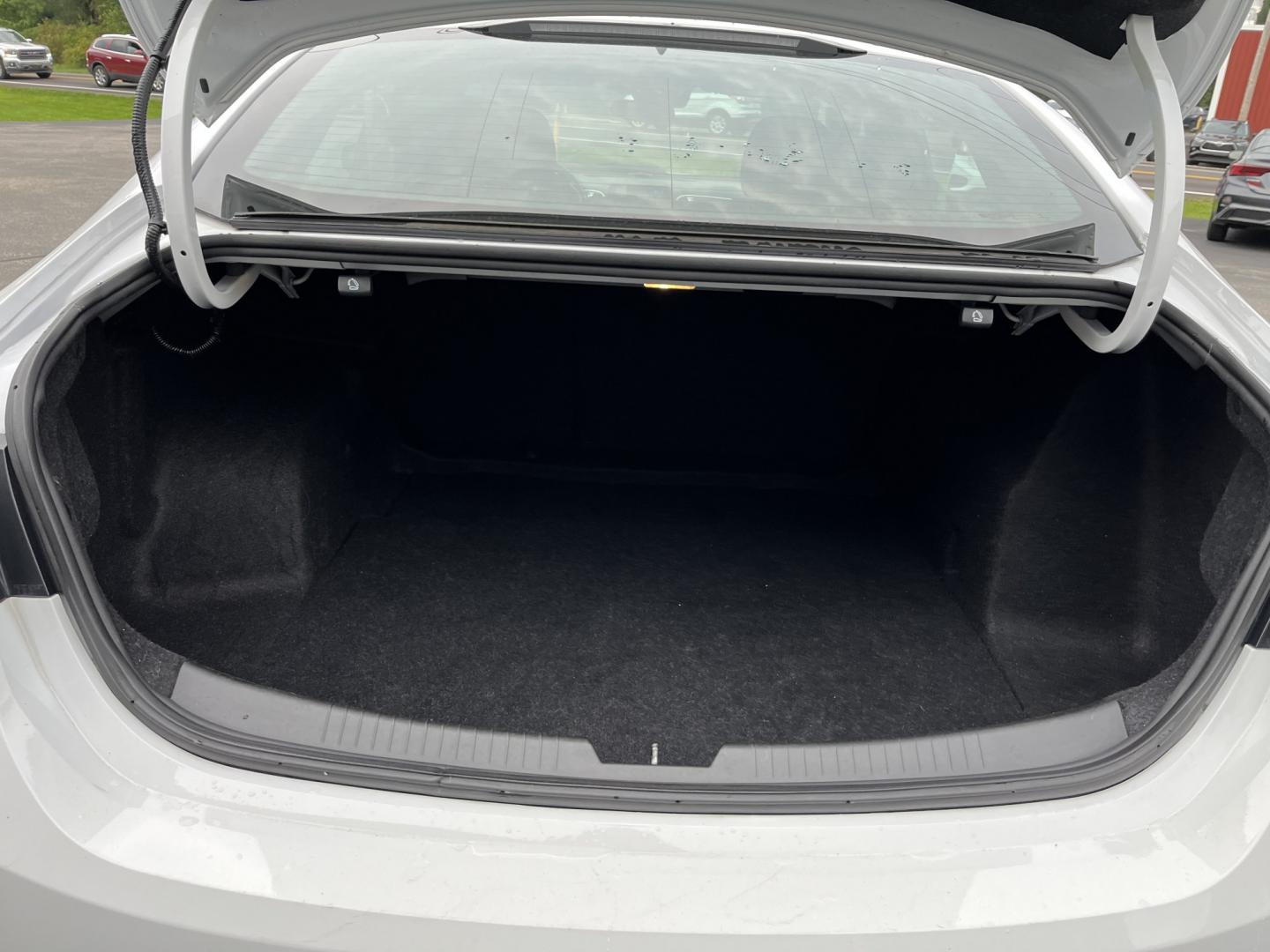 2021 White /Black Chevrolet Malibu LT (1G1ZD5ST7MF) with an 1.5L I4 DOHC 16V Turbo engine, Automatc transmission, located at 11115 Chardon Rd. , Chardon, OH, 44024, (440) 214-9705, 41.580246, -81.241943 - 2021 Chevrolet Malibu LT – Efficient Midsize Sedan with Redline Style and One-Owner History If you want a midsize sedan that looks sharper than a typical commuter car and still stays easy on fuel, this 2021 Chevrolet Malibu LT is a strong option. The 1.5L Turbocharged EcoTec engine delivers smoot- Photo#15