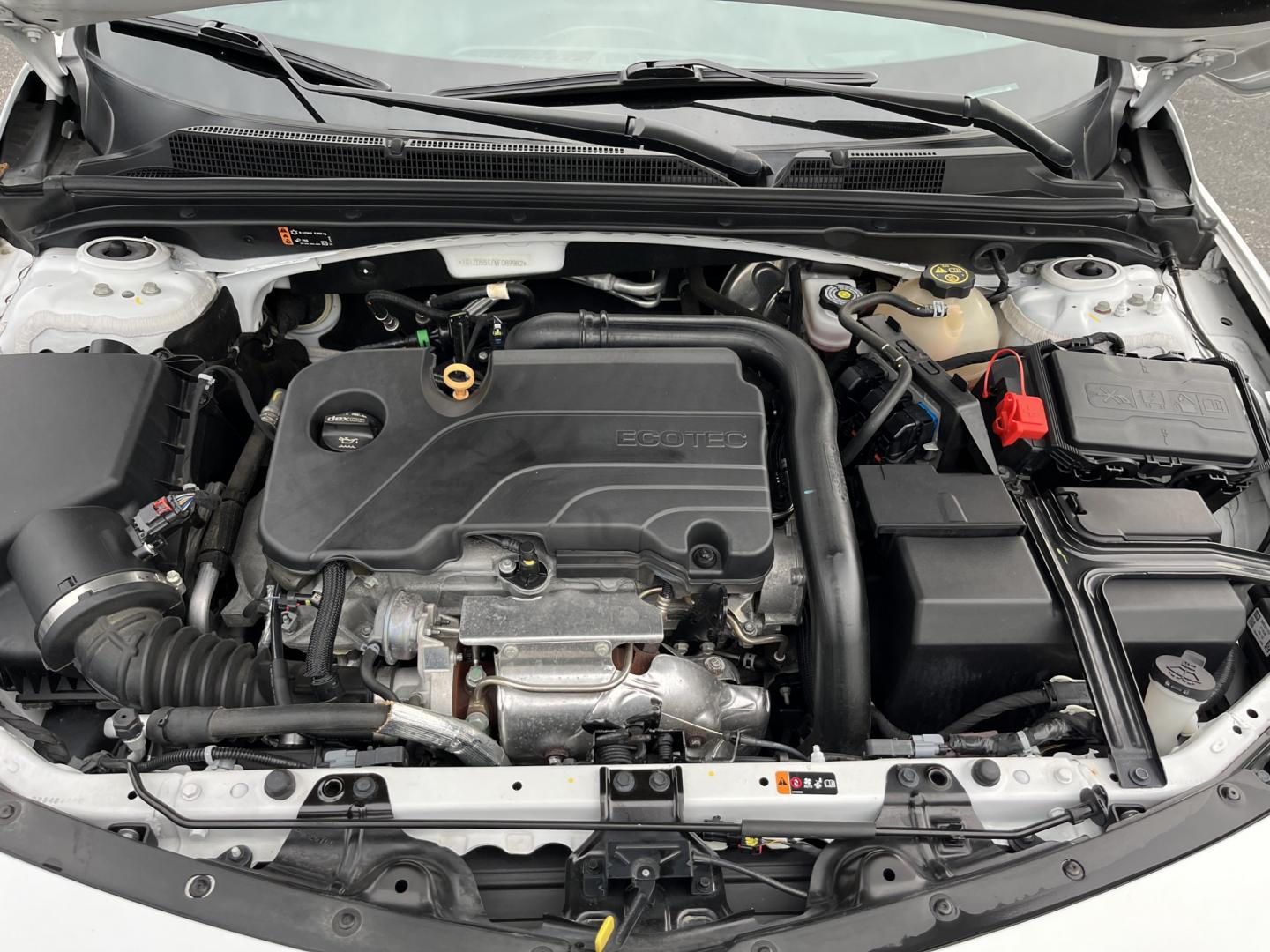 2021 White /Black Chevrolet Malibu LT (1G1ZD5ST7MF) with an 1.5L I4 DOHC 16V Turbo engine, Automatc transmission, located at 11115 Chardon Rd. , Chardon, OH, 44024, (440) 214-9705, 41.580246, -81.241943 - 2021 Chevrolet Malibu LT – Efficient Midsize Sedan with Redline Style and One-Owner History If you want a midsize sedan that looks sharper than a typical commuter car and still stays easy on fuel, this 2021 Chevrolet Malibu LT is a strong option. The 1.5L Turbocharged EcoTec engine delivers smoot- Photo#14