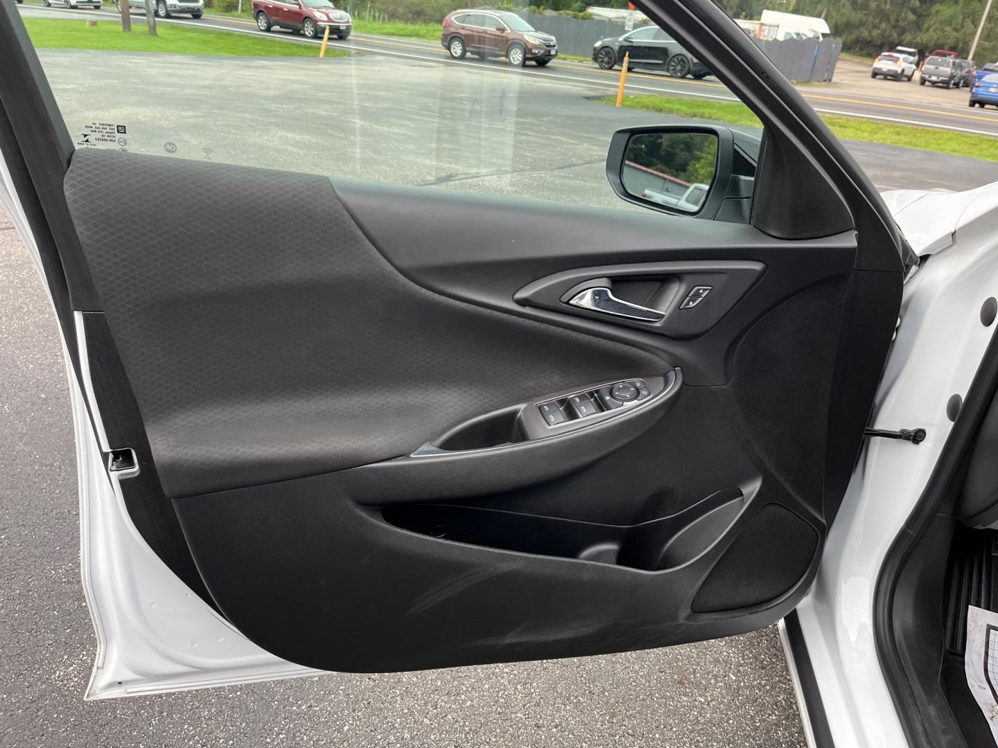 2021 White /Black Chevrolet Malibu LT (1G1ZD5ST7MF) with an 1.5L I4 DOHC 16V Turbo engine, Automatc transmission, located at 11115 Chardon Rd. , Chardon, OH, 44024, (440) 214-9705, 41.580246, -81.241943 - 2021 Chevrolet Malibu LT – Efficient Midsize Sedan with Redline Style and One-Owner History If you want a midsize sedan that looks sharper than a typical commuter car and still stays easy on fuel, this 2021 Chevrolet Malibu LT is a strong option. The 1.5L Turbocharged EcoTec engine delivers smoot- Photo#16