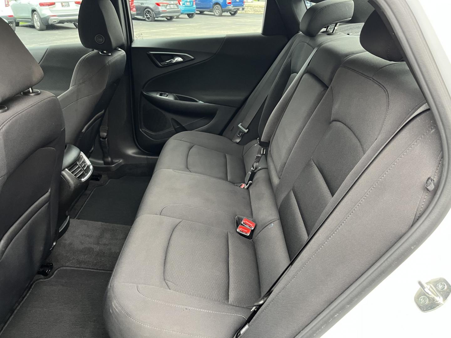 2021 White /Black Chevrolet Malibu LT (1G1ZD5ST7MF) with an 1.5L I4 DOHC 16V Turbo engine, Automatc transmission, located at 11115 Chardon Rd. , Chardon, OH, 44024, (440) 214-9705, 41.580246, -81.241943 - 2021 Chevrolet Malibu LT – Efficient Midsize Sedan with Redline Style and One-Owner History If you want a midsize sedan that looks sharper than a typical commuter car and still stays easy on fuel, this 2021 Chevrolet Malibu LT is a strong option. The 1.5L Turbocharged EcoTec engine delivers smoot- Photo#28