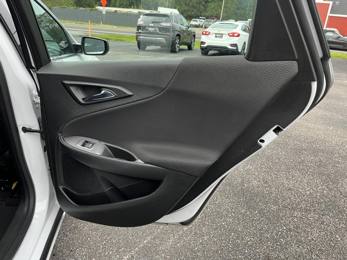 2021 White /Black Chevrolet Malibu LT (1G1ZD5ST7MF) with an 1.5L I4 DOHC 16V Turbo engine, Automatc transmission, located at 11115 Chardon Rd. , Chardon, OH, 44024, (440) 214-9705, 41.580246, -81.241943 - 2021 Chevrolet Malibu LT – Efficient Midsize Sedan with Redline Style and One-Owner History If you want a midsize sedan that looks sharper than a typical commuter car and still stays easy on fuel, this 2021 Chevrolet Malibu LT is a strong option. The 1.5L Turbocharged EcoTec engine delivers smoot- Photo#30