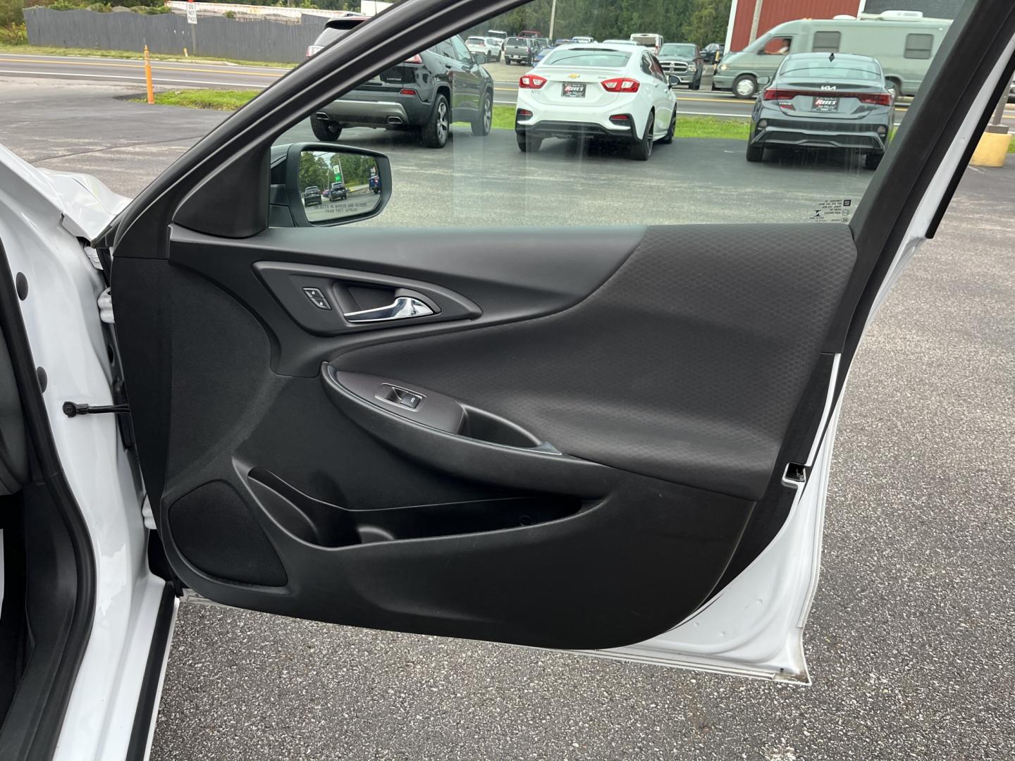 2021 White /Black Chevrolet Malibu LT (1G1ZD5ST7MF) with an 1.5L I4 DOHC 16V Turbo engine, Automatc transmission, located at 11115 Chardon Rd. , Chardon, OH, 44024, (440) 214-9705, 41.580246, -81.241943 - 2021 Chevrolet Malibu LT – Efficient Midsize Sedan with Redline Style and One-Owner History If you want a midsize sedan that looks sharper than a typical commuter car and still stays easy on fuel, this 2021 Chevrolet Malibu LT is a strong option. The 1.5L Turbocharged EcoTec engine delivers smoot- Photo#32