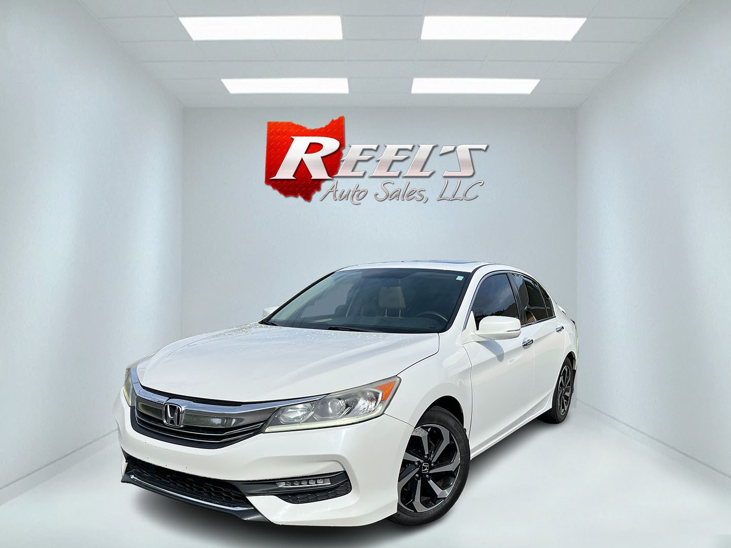 2017 White /Gray Honda Accord EX Sedan CVT (1HGCR2F7XHA) with an 2.4L I4 DOHC 16V engine, Automatic transmission, located at 11115 Chardon Rd. , Chardon, OH, 44024, (440) 214-9705, 41.580246, -81.241943 - 2017 Honda Accord EX – Efficient Midsize Comfort with Everyday Convenience If you want a midsize sedan that is easy to live with and still feels well equipped, this 2017 Honda Accord EX is a strong option. The reliable 2.4L K24 engine delivers smooth everyday power and an impressive 36 MPG highwa- Photo#0