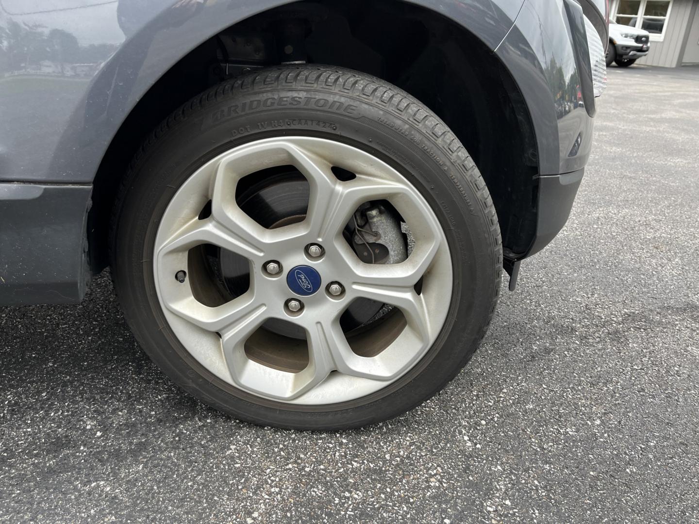2021 Gray /Black Ford EcoSport SE AWD (MAJ6S3GLXMC) with an 2.0L I4 DOHC 16V engine, Automatc transmission, located at 11115 Chardon Rd. , Chardon, OH, 44024, (440) 214-9705, 41.580246, -81.241943 - 2021 Ford EcoSport SE 4WD – Compact Convenience with All-Weather Capability and One-Owner History If you want a smaller SUV that is easy to park and still useful year-round, this 2021 Ford EcoSport SE 4WD is a practical choice. The 2.0L Duratec engine and 6-speed automatic deliver smooth everyday- Photo#5
