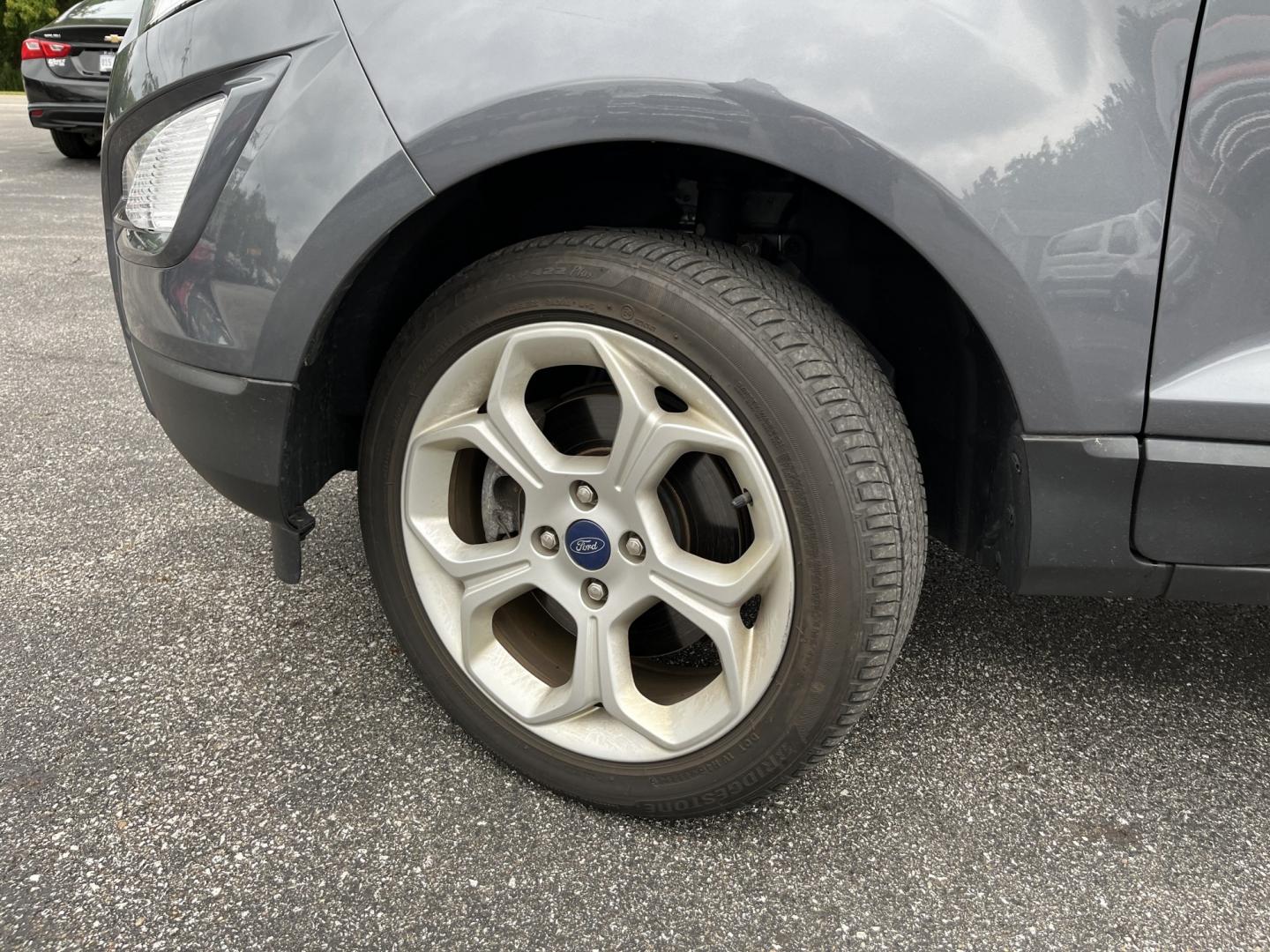 2021 Gray /Black Ford EcoSport SE AWD (MAJ6S3GLXMC) with an 2.0L I4 DOHC 16V engine, Automatc transmission, located at 11115 Chardon Rd. , Chardon, OH, 44024, (440) 214-9705, 41.580246, -81.241943 - 2021 Ford EcoSport SE 4WD – Compact Convenience with All-Weather Capability and One-Owner History If you want a smaller SUV that is easy to park and still useful year-round, this 2021 Ford EcoSport SE 4WD is a practical choice. The 2.0L Duratec engine and 6-speed automatic deliver smooth everyday- Photo#13
