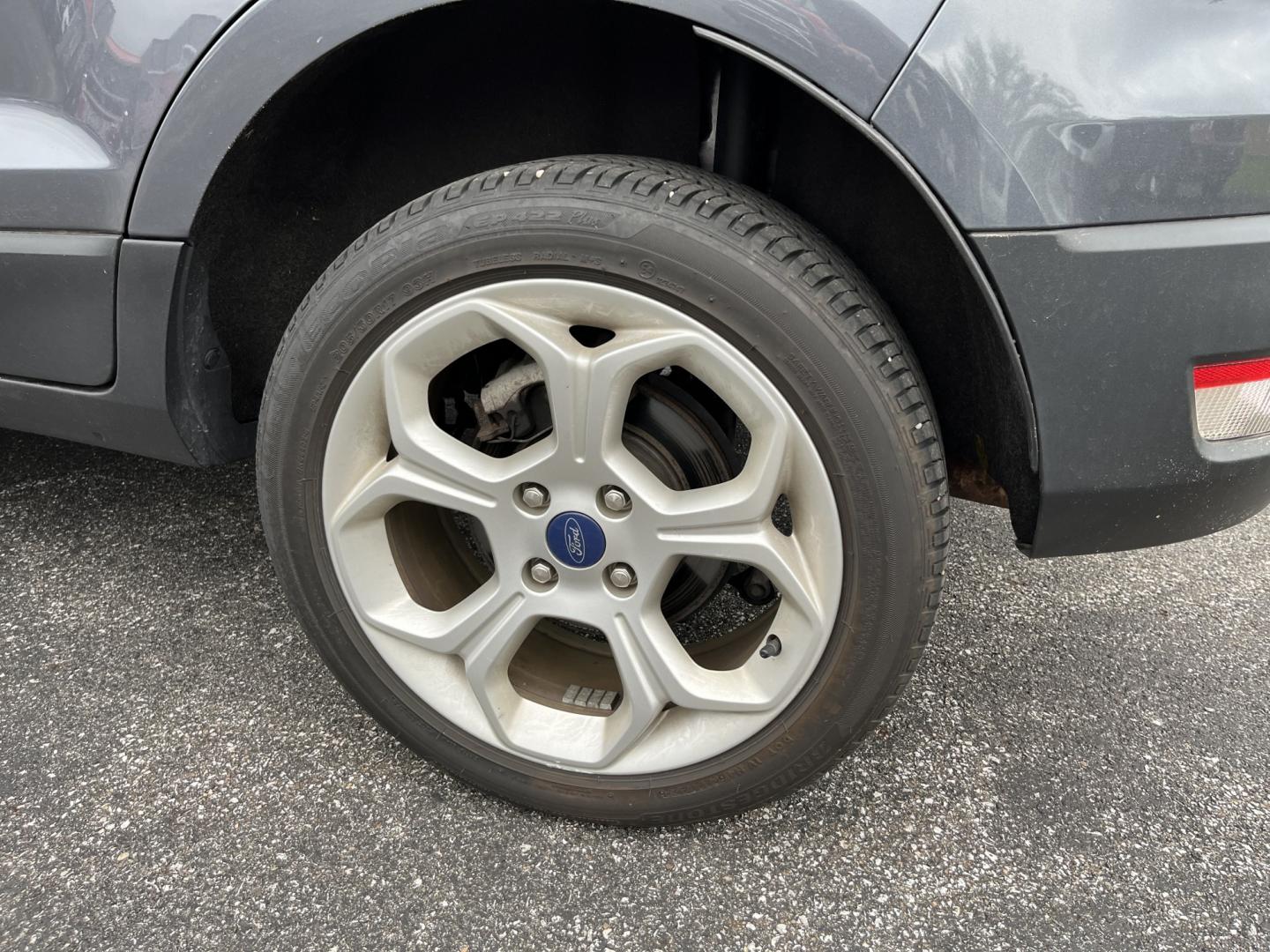 2021 Gray /Black Ford EcoSport SE AWD (MAJ6S3GLXMC) with an 2.0L I4 DOHC 16V engine, Automatc transmission, located at 11115 Chardon Rd. , Chardon, OH, 44024, (440) 214-9705, 41.580246, -81.241943 - 2021 Ford EcoSport SE 4WD – Compact Convenience with All-Weather Capability and One-Owner History If you want a smaller SUV that is easy to park and still useful year-round, this 2021 Ford EcoSport SE 4WD is a practical choice. The 2.0L Duratec engine and 6-speed automatic deliver smooth everyday- Photo#11