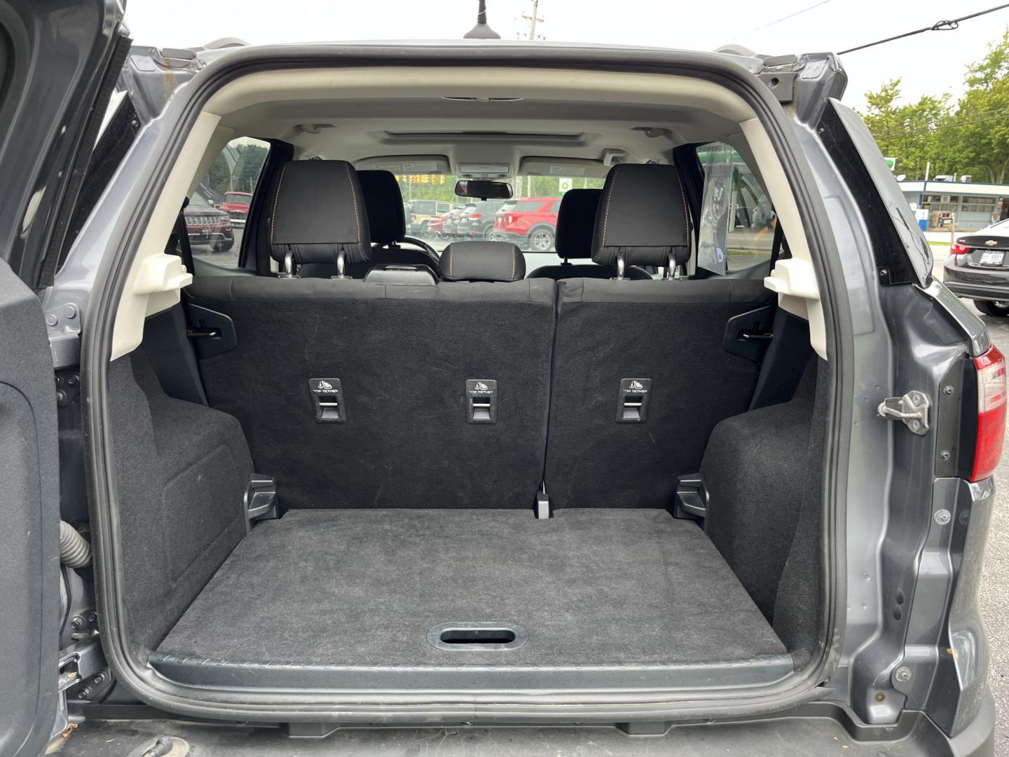 2021 Gray /Black Ford EcoSport SE AWD (MAJ6S3GLXMC) with an 2.0L I4 DOHC 16V engine, Automatc transmission, located at 11115 Chardon Rd. , Chardon, OH, 44024, (440) 214-9705, 41.580246, -81.241943 - 2021 Ford EcoSport SE 4WD – Compact Convenience with All-Weather Capability and One-Owner History If you want a smaller SUV that is easy to park and still useful year-round, this 2021 Ford EcoSport SE 4WD is a practical choice. The 2.0L Duratec engine and 6-speed automatic deliver smooth everyday- Photo#15