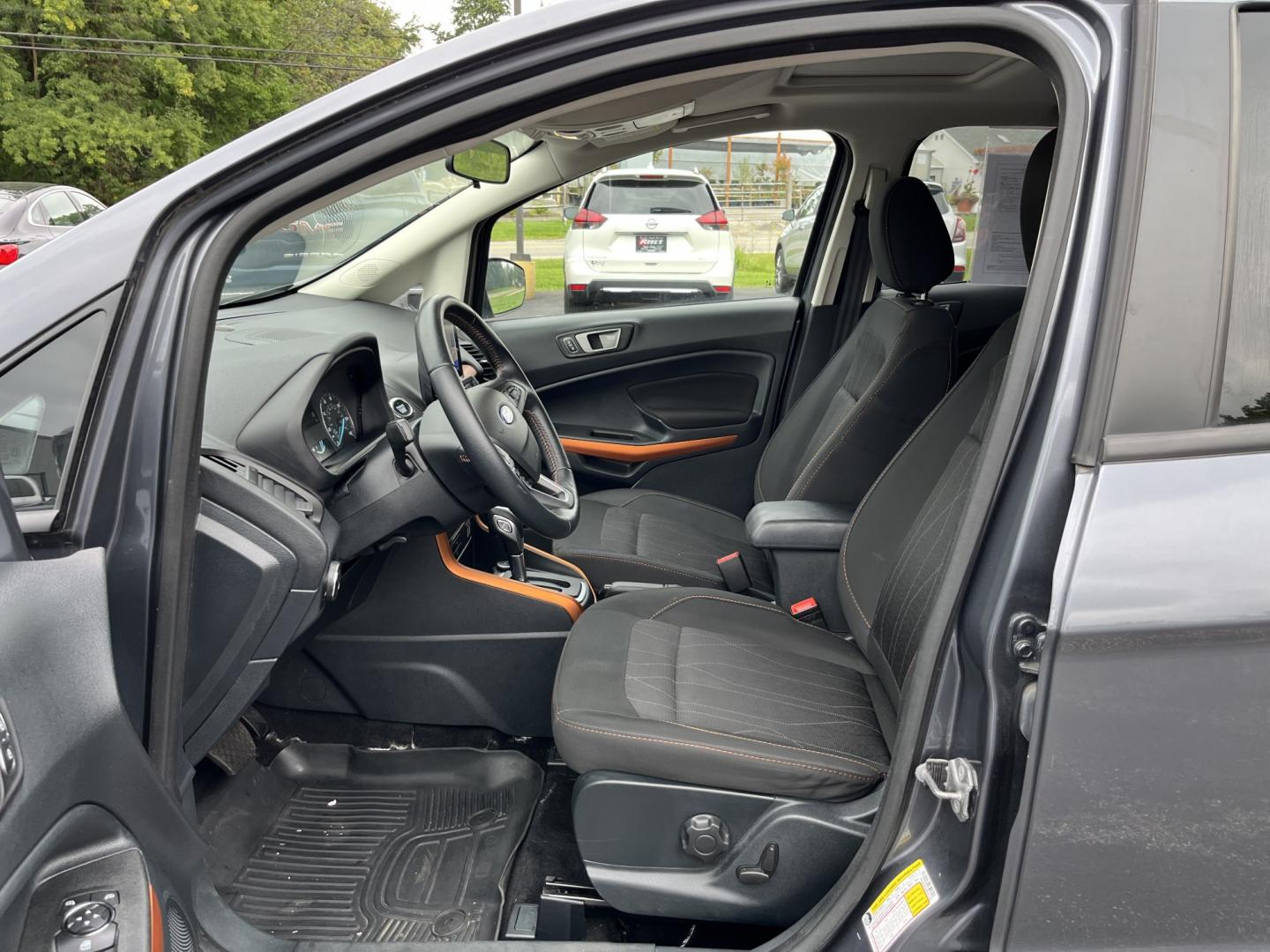 2021 Gray /Black Ford EcoSport SE AWD (MAJ6S3GLXMC) with an 2.0L I4 DOHC 16V engine, Automatc transmission, located at 11115 Chardon Rd. , Chardon, OH, 44024, (440) 214-9705, 41.580246, -81.241943 - 2021 Ford EcoSport SE 4WD – Compact Convenience with All-Weather Capability and One-Owner History If you want a smaller SUV that is easy to park and still useful year-round, this 2021 Ford EcoSport SE 4WD is a practical choice. The 2.0L Duratec engine and 6-speed automatic deliver smooth everyday- Photo#18