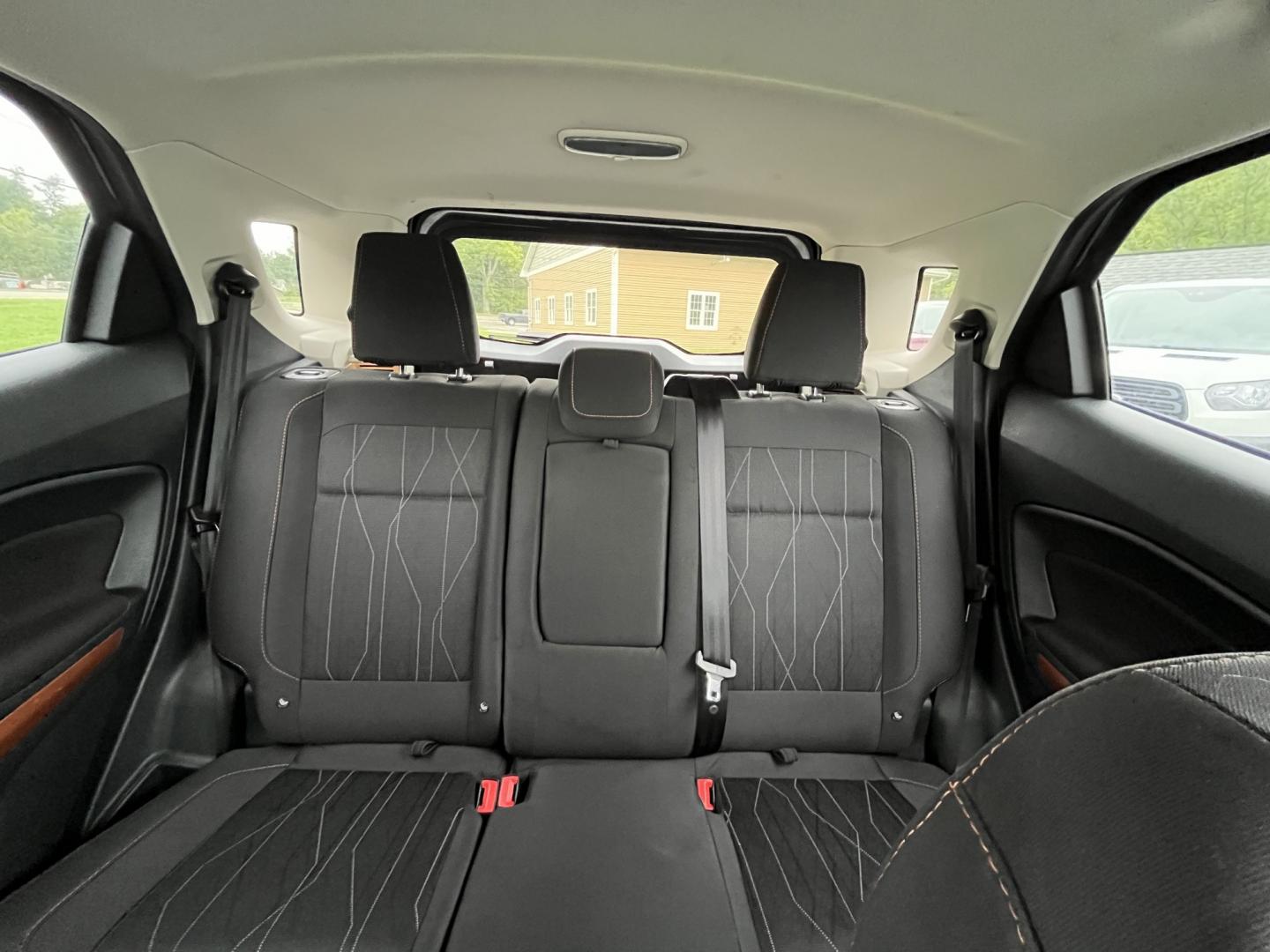 2021 Gray /Black Ford EcoSport SE AWD (MAJ6S3GLXMC) with an 2.0L I4 DOHC 16V engine, Automatc transmission, located at 11115 Chardon Rd. , Chardon, OH, 44024, (440) 214-9705, 41.580246, -81.241943 - 2021 Ford EcoSport SE 4WD – Compact Convenience with All-Weather Capability and One-Owner History If you want a smaller SUV that is easy to park and still useful year-round, this 2021 Ford EcoSport SE 4WD is a practical choice. The 2.0L Duratec engine and 6-speed automatic deliver smooth everyday- Photo#29