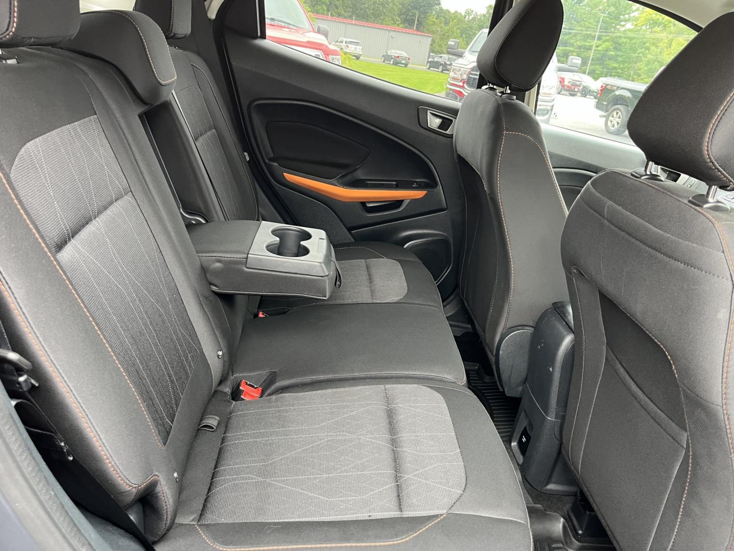 2021 Gray /Black Ford EcoSport SE AWD (MAJ6S3GLXMC) with an 2.0L I4 DOHC 16V engine, Automatc transmission, located at 11115 Chardon Rd. , Chardon, OH, 44024, (440) 214-9705, 41.580246, -81.241943 - 2021 Ford EcoSport SE 4WD – Compact Convenience with All-Weather Capability and One-Owner History If you want a smaller SUV that is easy to park and still useful year-round, this 2021 Ford EcoSport SE 4WD is a practical choice. The 2.0L Duratec engine and 6-speed automatic deliver smooth everyday- Photo#34