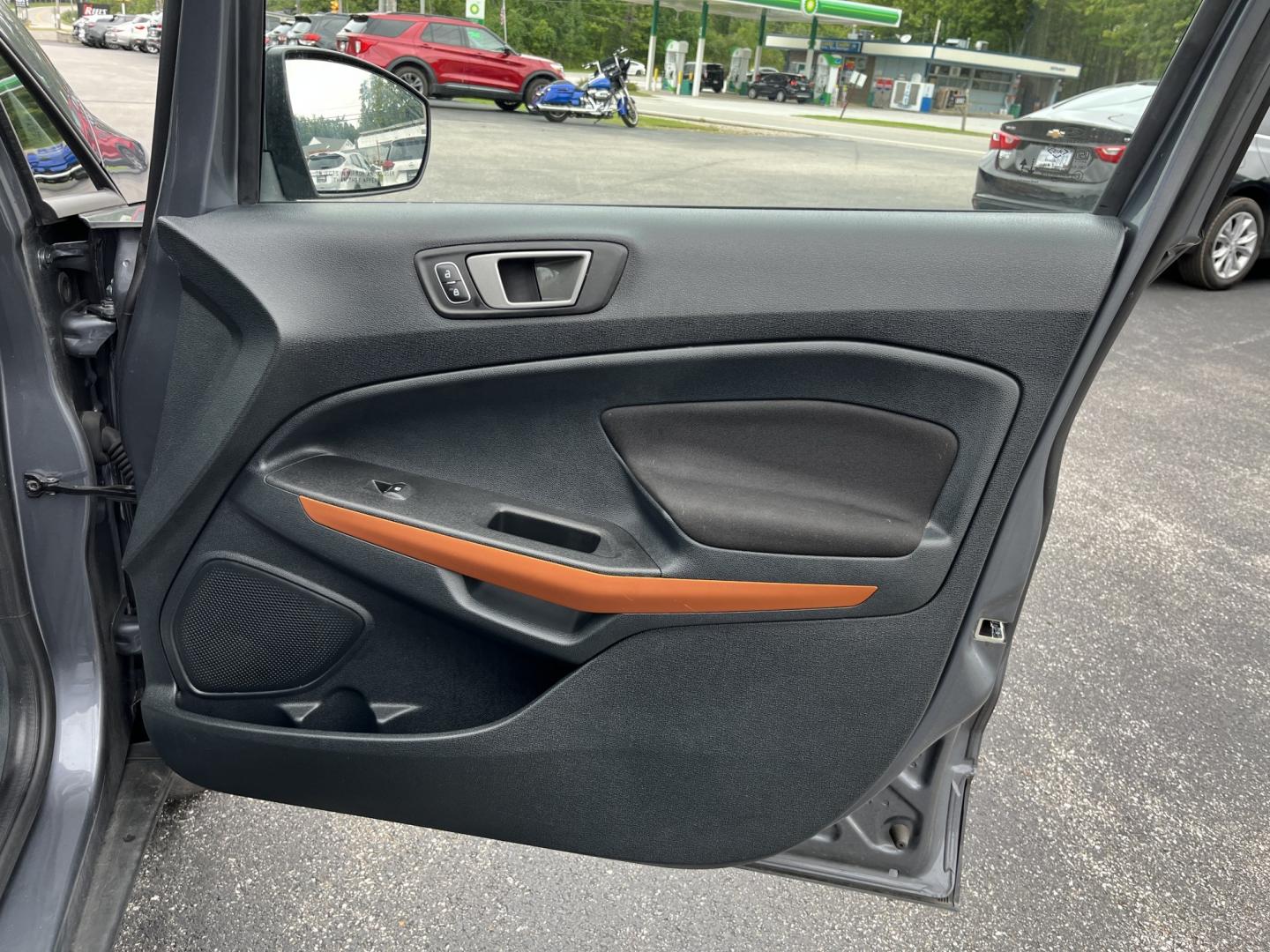 2021 Gray /Black Ford EcoSport SE AWD (MAJ6S3GLXMC) with an 2.0L I4 DOHC 16V engine, Automatc transmission, located at 11115 Chardon Rd. , Chardon, OH, 44024, (440) 214-9705, 41.580246, -81.241943 - 2021 Ford EcoSport SE 4WD – Compact Convenience with All-Weather Capability and One-Owner History If you want a smaller SUV that is easy to park and still useful year-round, this 2021 Ford EcoSport SE 4WD is a practical choice. The 2.0L Duratec engine and 6-speed automatic deliver smooth everyday- Photo#35