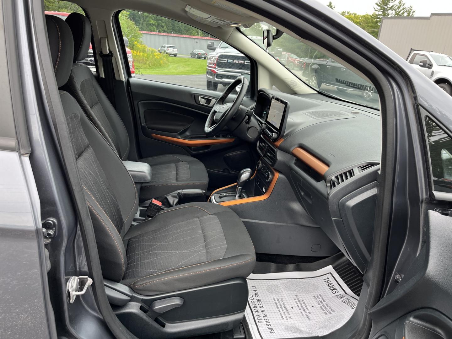 2021 Gray /Black Ford EcoSport SE AWD (MAJ6S3GLXMC) with an 2.0L I4 DOHC 16V engine, Automatc transmission, located at 11115 Chardon Rd. , Chardon, OH, 44024, (440) 214-9705, 41.580246, -81.241943 - 2021 Ford EcoSport SE 4WD – Compact Convenience with All-Weather Capability and One-Owner History If you want a smaller SUV that is easy to park and still useful year-round, this 2021 Ford EcoSport SE 4WD is a practical choice. The 2.0L Duratec engine and 6-speed automatic deliver smooth everyday- Photo#36