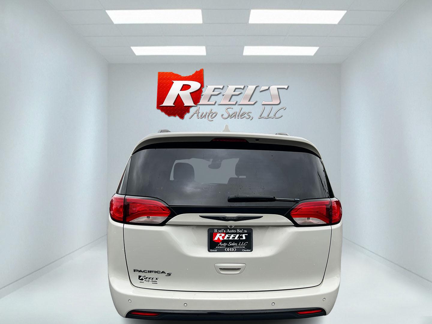 2020 White /Black Chrysler Pacifica Touring-L (2C4RC1BG0LR) with an 3.6L V6 DOHC 24V engine, Automatc transmission, located at 11115 Chardon Rd. , Chardon, OH, 44024, (440) 214-9705, 41.580246, -81.241943 - 2020 Chrysler Pacifica Touring L – Family-Ready Minivan with Fresh Tires and Strong Convenience Features If you want a minivan that makes daily routines and longer trips easier, this 2020 Chrysler Pacifica Touring L is a strong option. The 3.6L Pentastar V6 and 9-speed automatic deliver smooth po- Photo#8