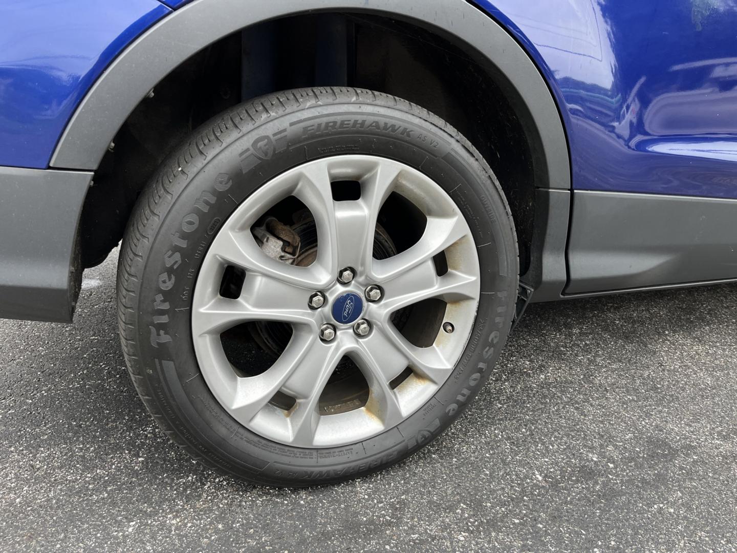 2016 Blue /Gray Ford Escape Titanium 4WD (1FMCU9JX3GU) with an 1.6L I4 DOHC 16V TURBO engine, Automatc transmission, located at 11115 Chardon Rd. , Chardon, OH, 44024, (440) 214-9705, 41.580246, -81.241943 - 2016 Ford Escape Titanium 4WD – Premium Compact SUV with Comfort and Everyday Convenience If you want a compact SUV that feels a step above a base model, this 2016 Ford Escape Titanium 4WD is a strong option. The 1.6L Turbocharged EcoBoost engine and 6-speed automatic deliver responsive power and- Photo#8