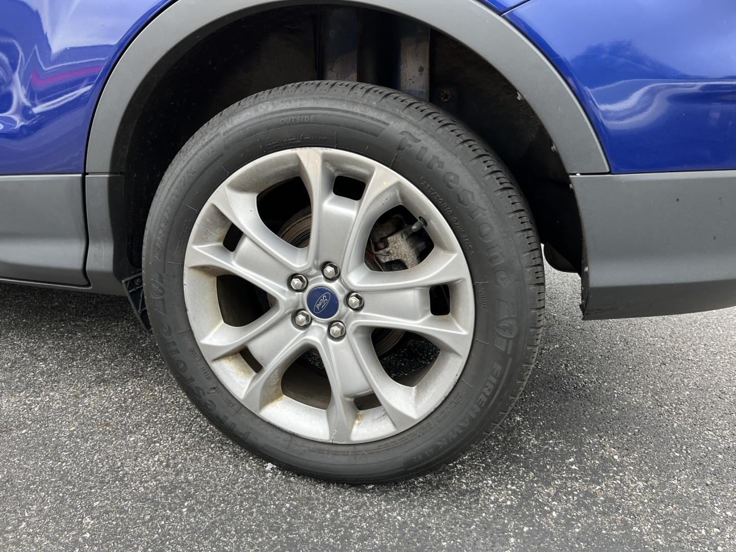 2016 Blue /Gray Ford Escape Titanium 4WD (1FMCU9JX3GU) with an 1.6L I4 DOHC 16V TURBO engine, Automatc transmission, located at 11115 Chardon Rd. , Chardon, OH, 44024, (440) 214-9705, 41.580246, -81.241943 - 2016 Ford Escape Titanium 4WD – Premium Compact SUV with Comfort and Everyday Convenience If you want a compact SUV that feels a step above a base model, this 2016 Ford Escape Titanium 4WD is a strong option. The 1.6L Turbocharged EcoBoost engine and 6-speed automatic deliver responsive power and- Photo#11