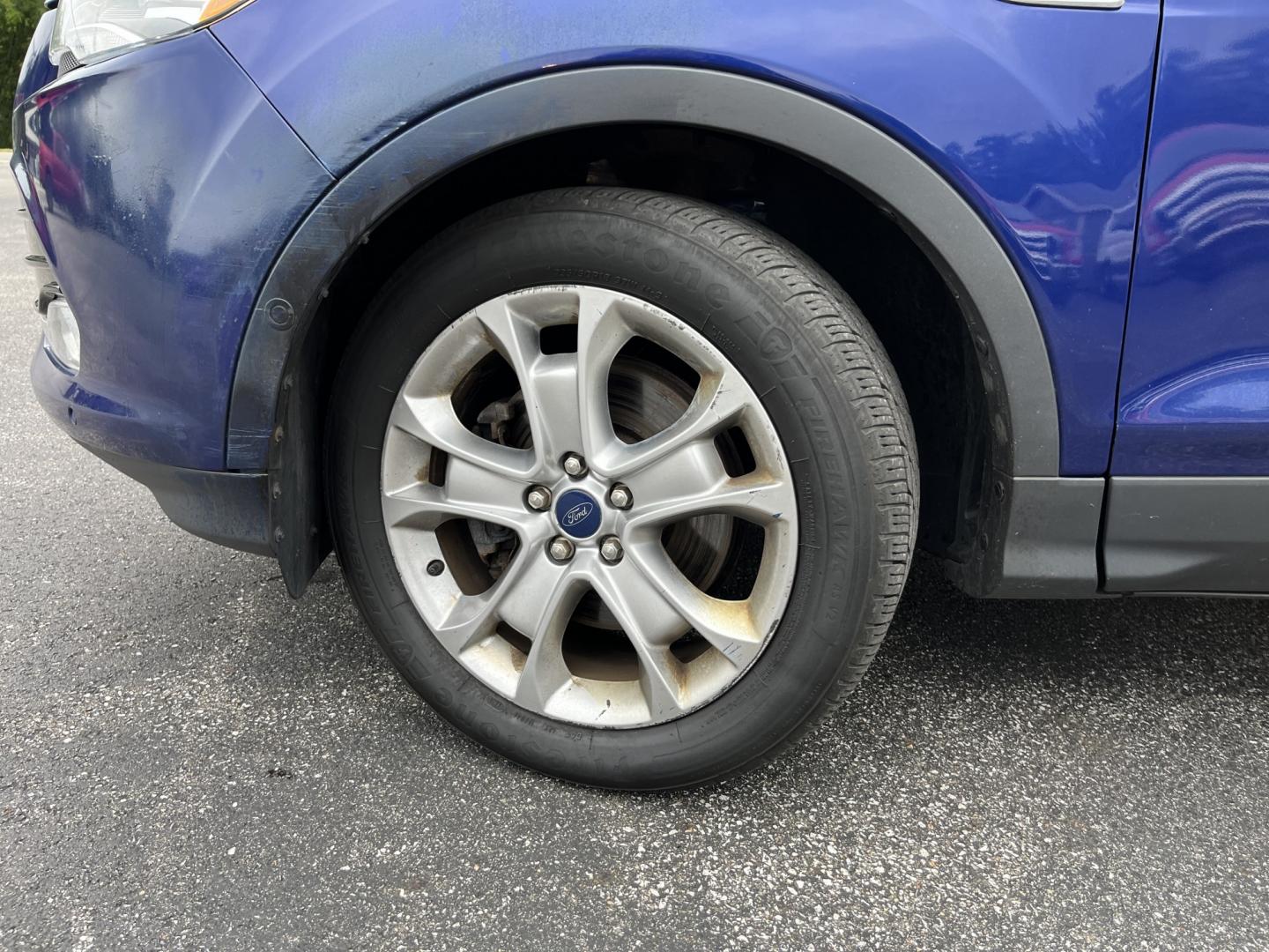 2016 Blue /Gray Ford Escape Titanium 4WD (1FMCU9JX3GU) with an 1.6L I4 DOHC 16V TURBO engine, Automatc transmission, located at 11115 Chardon Rd. , Chardon, OH, 44024, (440) 214-9705, 41.580246, -81.241943 - 2016 Ford Escape Titanium 4WD – Premium Compact SUV with Comfort and Everyday Convenience If you want a compact SUV that feels a step above a base model, this 2016 Ford Escape Titanium 4WD is a strong option. The 1.6L Turbocharged EcoBoost engine and 6-speed automatic deliver responsive power and- Photo#13