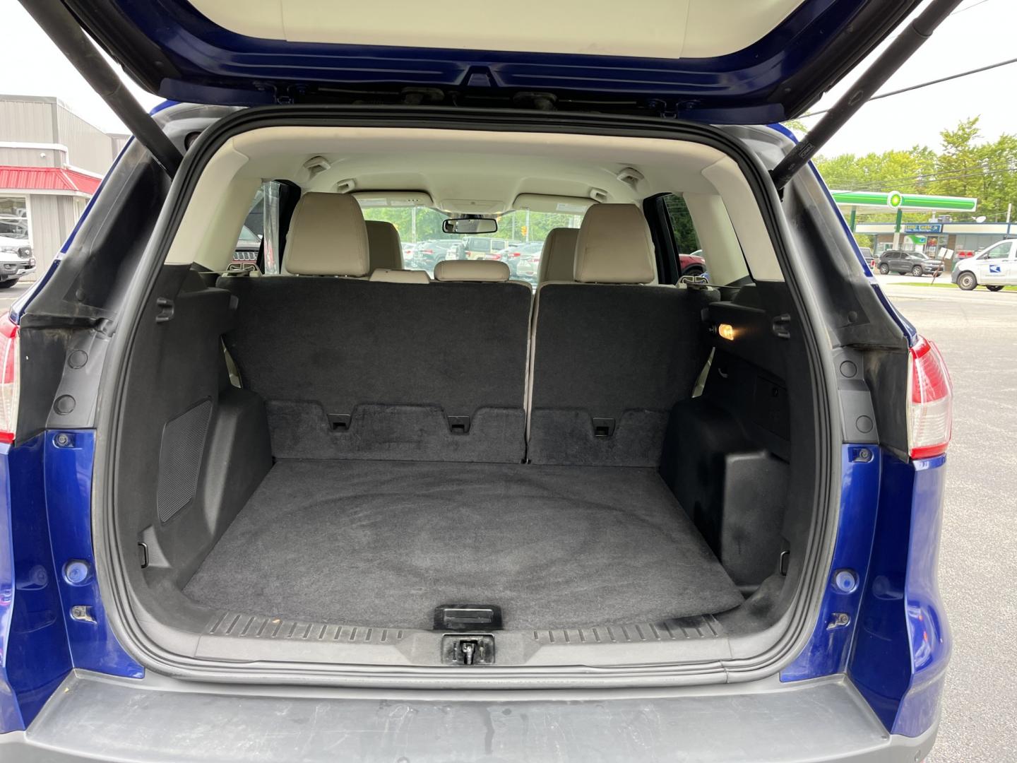 2016 Blue /Gray Ford Escape Titanium 4WD (1FMCU9JX3GU) with an 1.6L I4 DOHC 16V TURBO engine, Automatc transmission, located at 11115 Chardon Rd. , Chardon, OH, 44024, (440) 214-9705, 41.580246, -81.241943 - 2016 Ford Escape Titanium 4WD – Premium Compact SUV with Comfort and Everyday Convenience If you want a compact SUV that feels a step above a base model, this 2016 Ford Escape Titanium 4WD is a strong option. The 1.6L Turbocharged EcoBoost engine and 6-speed automatic deliver responsive power and- Photo#15