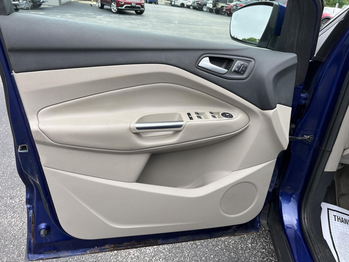 2016 Blue /Gray Ford Escape Titanium 4WD (1FMCU9JX3GU) with an 1.6L I4 DOHC 16V TURBO engine, Automatc transmission, located at 11115 Chardon Rd. , Chardon, OH, 44024, (440) 214-9705, 41.580246, -81.241943 - 2016 Ford Escape Titanium 4WD – Premium Compact SUV with Comfort and Everyday Convenience If you want a compact SUV that feels a step above a base model, this 2016 Ford Escape Titanium 4WD is a strong option. The 1.6L Turbocharged EcoBoost engine and 6-speed automatic deliver responsive power and- Photo#17