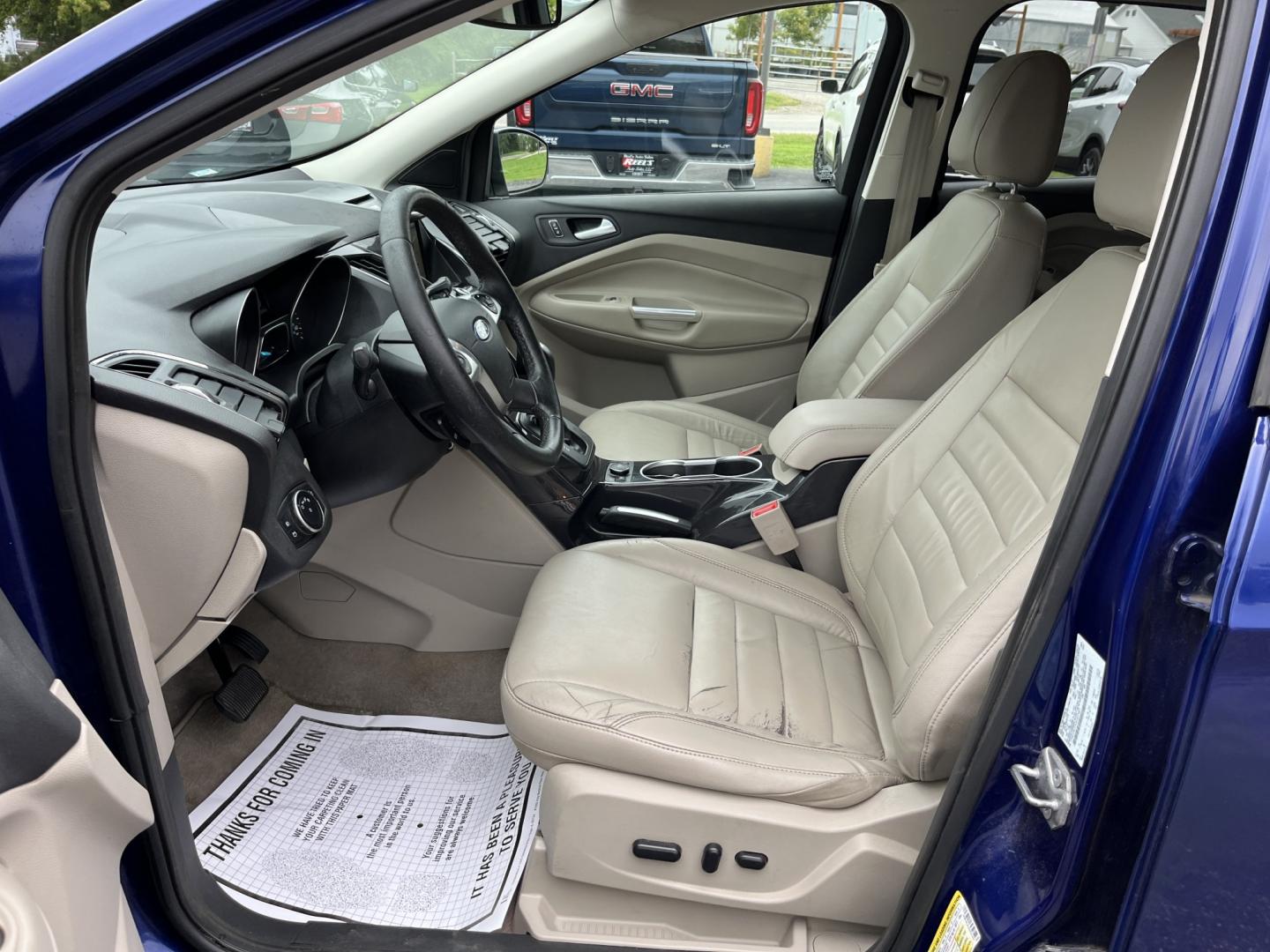 2016 Blue /Gray Ford Escape Titanium 4WD (1FMCU9JX3GU) with an 1.6L I4 DOHC 16V TURBO engine, Automatc transmission, located at 11115 Chardon Rd. , Chardon, OH, 44024, (440) 214-9705, 41.580246, -81.241943 - 2016 Ford Escape Titanium 4WD – Premium Compact SUV with Comfort and Everyday Convenience If you want a compact SUV that feels a step above a base model, this 2016 Ford Escape Titanium 4WD is a strong option. The 1.6L Turbocharged EcoBoost engine and 6-speed automatic deliver responsive power and- Photo#19