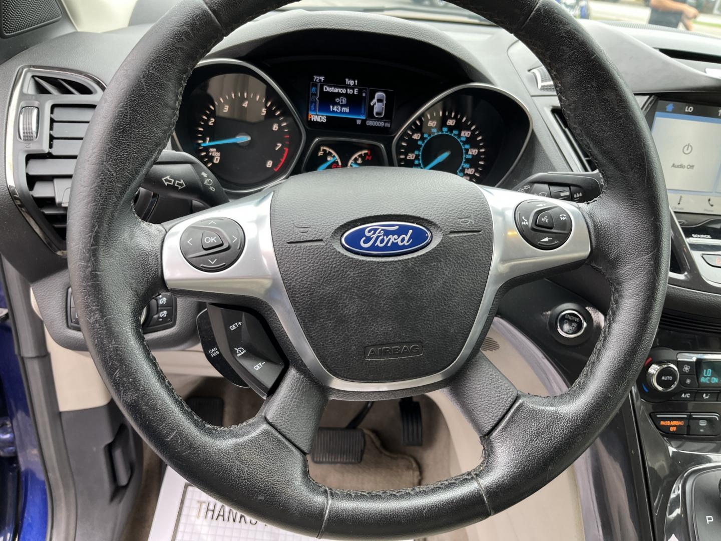 2016 Blue /Gray Ford Escape Titanium 4WD (1FMCU9JX3GU) with an 1.6L I4 DOHC 16V TURBO engine, Automatc transmission, located at 11115 Chardon Rd. , Chardon, OH, 44024, (440) 214-9705, 41.580246, -81.241943 - 2016 Ford Escape Titanium 4WD – Premium Compact SUV with Comfort and Everyday Convenience If you want a compact SUV that feels a step above a base model, this 2016 Ford Escape Titanium 4WD is a strong option. The 1.6L Turbocharged EcoBoost engine and 6-speed automatic deliver responsive power and- Photo#20
