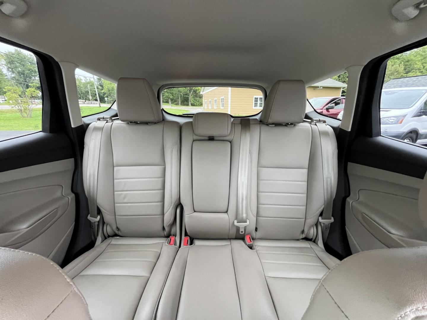 2016 Blue /Gray Ford Escape Titanium 4WD (1FMCU9JX3GU) with an 1.6L I4 DOHC 16V TURBO engine, Automatc transmission, located at 11115 Chardon Rd. , Chardon, OH, 44024, (440) 214-9705, 41.580246, -81.241943 - 2016 Ford Escape Titanium 4WD – Premium Compact SUV with Comfort and Everyday Convenience If you want a compact SUV that feels a step above a base model, this 2016 Ford Escape Titanium 4WD is a strong option. The 1.6L Turbocharged EcoBoost engine and 6-speed automatic deliver responsive power and- Photo#23