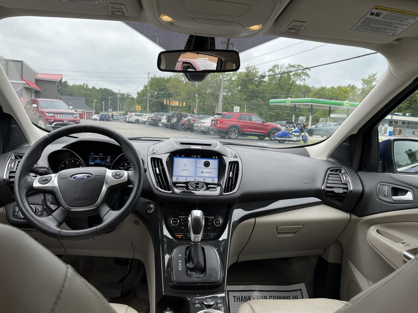 2016 Blue /Gray Ford Escape Titanium 4WD (1FMCU9JX3GU) with an 1.6L I4 DOHC 16V TURBO engine, Automatc transmission, located at 11115 Chardon Rd. , Chardon, OH, 44024, (440) 214-9705, 41.580246, -81.241943 - 2016 Ford Escape Titanium 4WD – Premium Compact SUV with Comfort and Everyday Convenience If you want a compact SUV that feels a step above a base model, this 2016 Ford Escape Titanium 4WD is a strong option. The 1.6L Turbocharged EcoBoost engine and 6-speed automatic deliver responsive power and- Photo#26