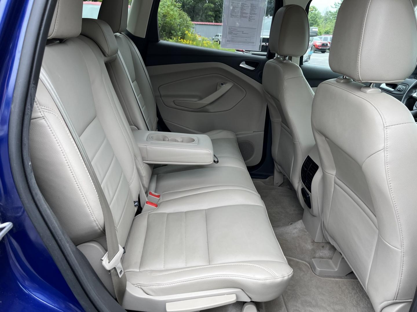 2016 Blue /Gray Ford Escape Titanium 4WD (1FMCU9JX3GU) with an 1.6L I4 DOHC 16V TURBO engine, Automatc transmission, located at 11115 Chardon Rd. , Chardon, OH, 44024, (440) 214-9705, 41.580246, -81.241943 - 2016 Ford Escape Titanium 4WD – Premium Compact SUV with Comfort and Everyday Convenience If you want a compact SUV that feels a step above a base model, this 2016 Ford Escape Titanium 4WD is a strong option. The 1.6L Turbocharged EcoBoost engine and 6-speed automatic deliver responsive power and- Photo#28