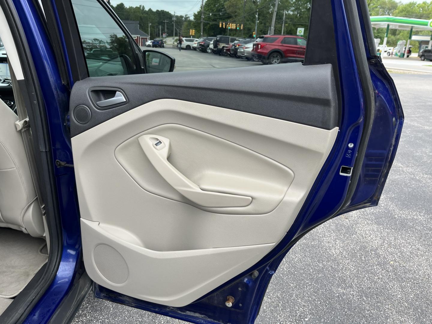 2016 Blue /Gray Ford Escape Titanium 4WD (1FMCU9JX3GU) with an 1.6L I4 DOHC 16V TURBO engine, Automatc transmission, located at 11115 Chardon Rd. , Chardon, OH, 44024, (440) 214-9705, 41.580246, -81.241943 - 2016 Ford Escape Titanium 4WD – Premium Compact SUV with Comfort and Everyday Convenience If you want a compact SUV that feels a step above a base model, this 2016 Ford Escape Titanium 4WD is a strong option. The 1.6L Turbocharged EcoBoost engine and 6-speed automatic deliver responsive power and- Photo#27