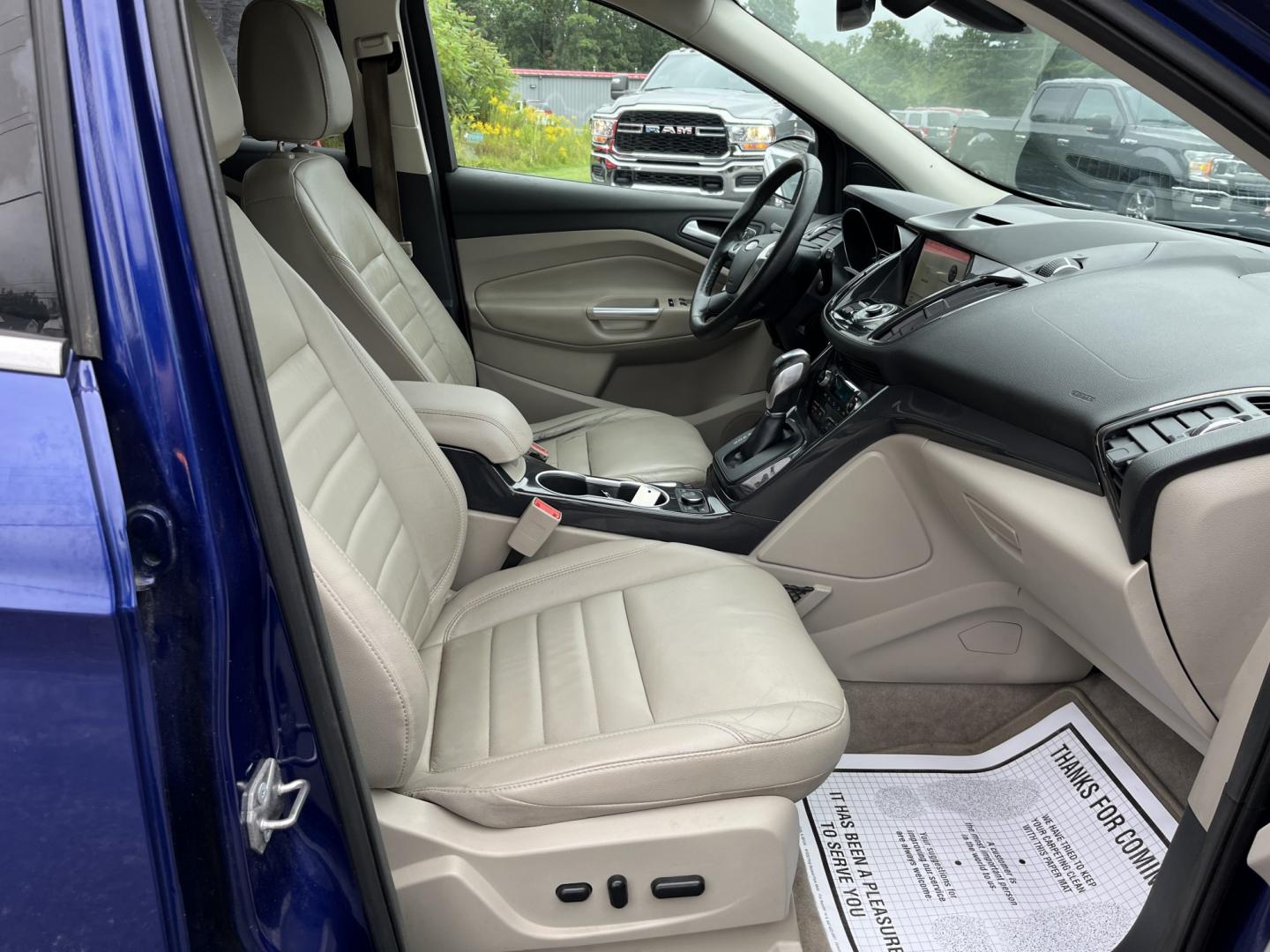 2016 Blue /Gray Ford Escape Titanium 4WD (1FMCU9JX3GU) with an 1.6L I4 DOHC 16V TURBO engine, Automatc transmission, located at 11115 Chardon Rd. , Chardon, OH, 44024, (440) 214-9705, 41.580246, -81.241943 - 2016 Ford Escape Titanium 4WD – Premium Compact SUV with Comfort and Everyday Convenience If you want a compact SUV that feels a step above a base model, this 2016 Ford Escape Titanium 4WD is a strong option. The 1.6L Turbocharged EcoBoost engine and 6-speed automatic deliver responsive power and- Photo#30