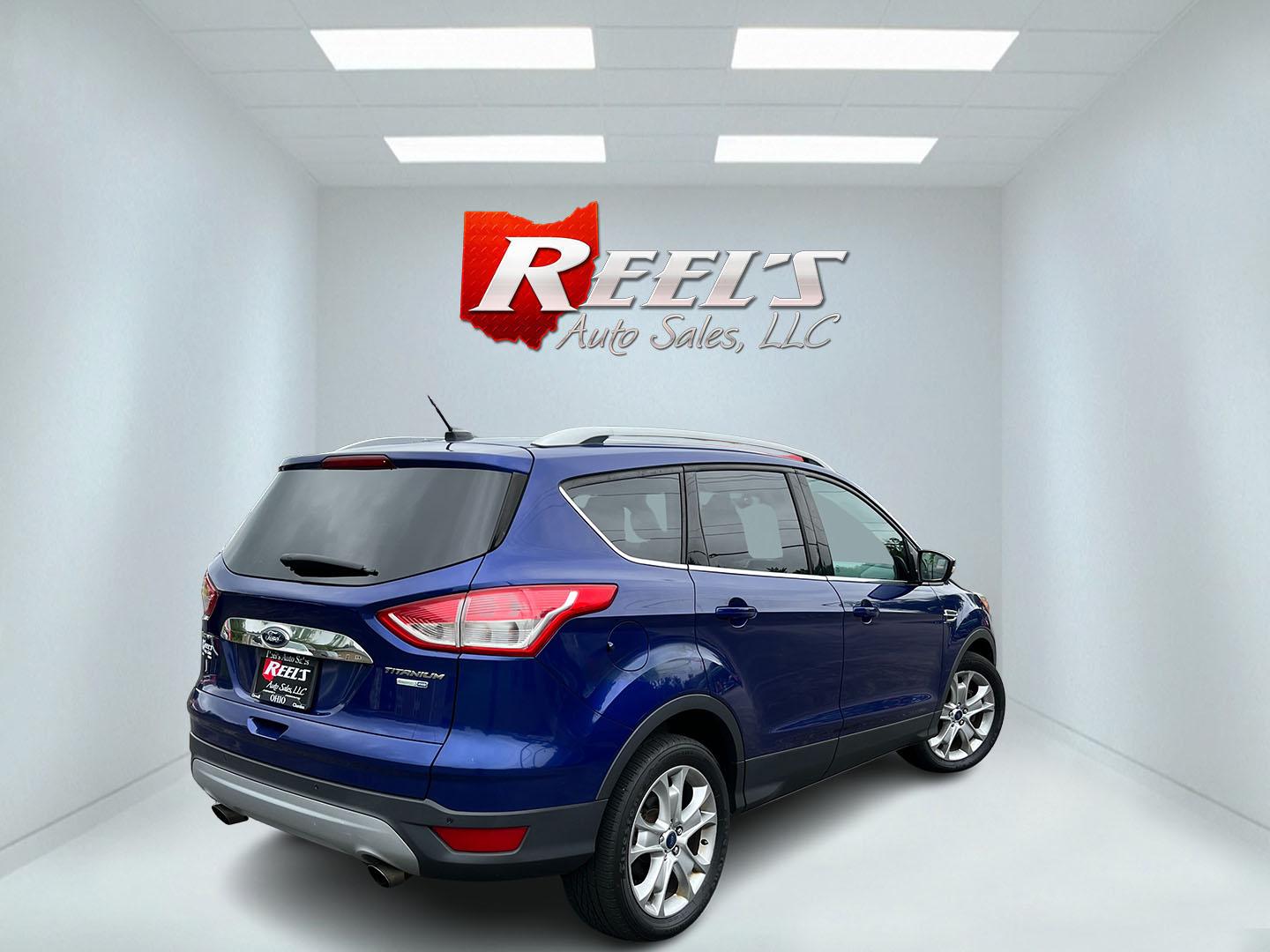 2016 Blue /Gray Ford Escape Titanium 4WD (1FMCU9JX3GU) with an 1.6L I4 DOHC 16V TURBO engine, Automatc transmission, located at 11115 Chardon Rd. , Chardon, OH, 44024, (440) 214-9705, 41.580246, -81.241943 - 2016 Ford Escape Titanium 4WD – Premium Compact SUV with Comfort and Everyday Convenience If you want a compact SUV that feels a step above a base model, this 2016 Ford Escape Titanium 4WD is a strong option. The 1.6L Turbocharged EcoBoost engine and 6-speed automatic deliver responsive power and- Photo#7