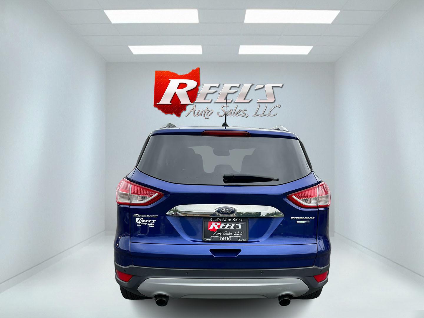 2016 Blue /Gray Ford Escape Titanium 4WD (1FMCU9JX3GU) with an 1.6L I4 DOHC 16V TURBO engine, Automatc transmission, located at 11115 Chardon Rd. , Chardon, OH, 44024, (440) 214-9705, 41.580246, -81.241943 - 2016 Ford Escape Titanium 4WD – Premium Compact SUV with Comfort and Everyday Convenience If you want a compact SUV that feels a step above a base model, this 2016 Ford Escape Titanium 4WD is a strong option. The 1.6L Turbocharged EcoBoost engine and 6-speed automatic deliver responsive power and- Photo#9