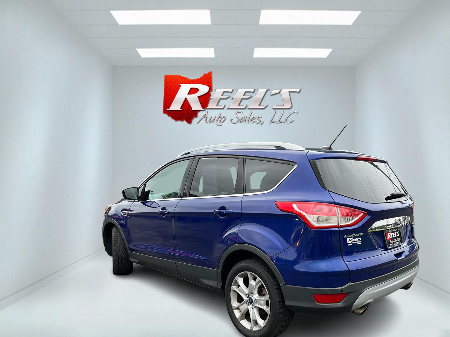 2016 Blue /Gray Ford Escape Titanium 4WD (1FMCU9JX3GU) with an 1.6L I4 DOHC 16V TURBO engine, Automatc transmission, located at 11115 Chardon Rd. , Chardon, OH, 44024, (440) 214-9705, 41.580246, -81.241943 - 2016 Ford Escape Titanium 4WD – Premium Compact SUV with Comfort and Everyday Convenience If you want a compact SUV that feels a step above a base model, this 2016 Ford Escape Titanium 4WD is a strong option. The 1.6L Turbocharged EcoBoost engine and 6-speed automatic deliver responsive power and- Photo#10