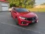 2021 Red /Black Honda Civic Sport Hatchback CVT (SHHFK7H42MU) with an 1.5L I4 16V DOHC TURBO engine, Automatic transmission, located at 547 E. Main St., Orwell, OH, 44076, (440) 437-5893, 41.535435, -80.847855 - 2021 Honda Civic Hatchback Sport – Efficient, Sporty, and Easy to Live With If you want a compact hatchback that feels current, efficient, and enjoyable to drive, this 2021 Honda Civic Hatchback Sport is a strong option. The 1.5L Turbocharged engine delivers responsive power and an impressive 40- Photo#2