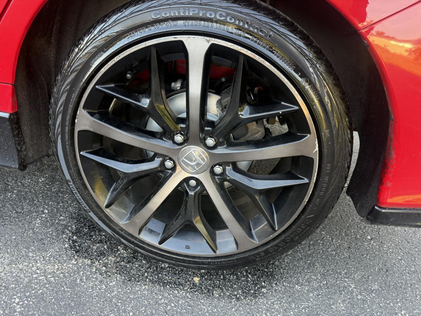 2021 Red /Black Honda Civic Sport Hatchback CVT (SHHFK7H42MU) with an 1.5L I4 16V DOHC TURBO engine, Automatic transmission, located at 547 E. Main St., Orwell, OH, 44076, (440) 437-5893, 41.535435, -80.847855 - 2021 Honda Civic Hatchback Sport – Efficient, Sporty, and Easy to Live With If you want a compact hatchback that feels current, efficient, and enjoyable to drive, this 2021 Honda Civic Hatchback Sport is a strong option. The 1.5L Turbocharged engine delivers responsive power and an impressive 40- Photo#24