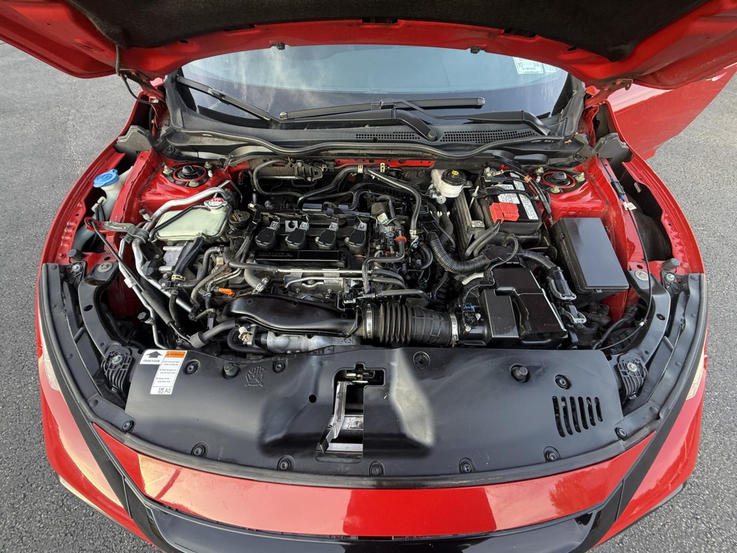 2021 Red /Black Honda Civic Sport Hatchback CVT (SHHFK7H42MU) with an 1.5L I4 16V DOHC TURBO engine, Automatic transmission, located at 547 E. Main St., Orwell, OH, 44076, (440) 437-5893, 41.535435, -80.847855 - 2021 Honda Civic Hatchback Sport – Efficient, Sporty, and Easy to Live With If you want a compact hatchback that feels current, efficient, and enjoyable to drive, this 2021 Honda Civic Hatchback Sport is a strong option. The 1.5L Turbocharged engine delivers responsive power and an impressive 40- Photo#5