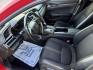 2021 Red /Black Honda Civic Sport Hatchback CVT (SHHFK7H42MU) with an 1.5L I4 16V DOHC TURBO engine, Automatic transmission, located at 547 E. Main St., Orwell, OH, 44076, (440) 437-5893, 41.535435, -80.847855 - 2021 Honda Civic Hatchback Sport – Efficient, Sporty, and Easy to Live With If you want a compact hatchback that feels current, efficient, and enjoyable to drive, this 2021 Honda Civic Hatchback Sport is a strong option. The 1.5L Turbocharged engine delivers responsive power and an impressive 40- Photo#6