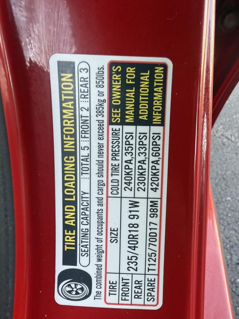 2021 Red /Black Honda Civic Sport Hatchback CVT (SHHFK7H42MU) with an 1.5L I4 16V DOHC TURBO engine, Automatic transmission, located at 547 E. Main St., Orwell, OH, 44076, (440) 437-5893, 41.535435, -80.847855 - 2021 Honda Civic Hatchback Sport – Efficient, Sporty, and Easy to Live With If you want a compact hatchback that feels current, efficient, and enjoyable to drive, this 2021 Honda Civic Hatchback Sport is a strong option. The 1.5L Turbocharged engine delivers responsive power and an impressive 40- Photo#27