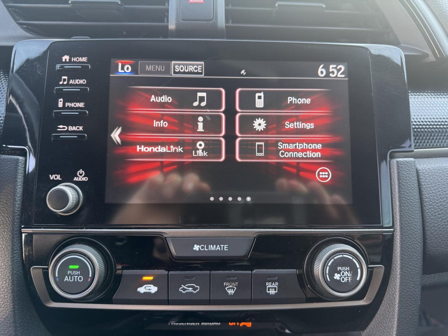 2021 Red /Black Honda Civic Sport Hatchback CVT (SHHFK7H42MU) with an 1.5L I4 16V DOHC TURBO engine, Automatic transmission, located at 547 E. Main St., Orwell, OH, 44076, (440) 437-5893, 41.535435, -80.847855 - 2021 Honda Civic Hatchback Sport – Efficient, Sporty, and Easy to Live With If you want a compact hatchback that feels current, efficient, and enjoyable to drive, this 2021 Honda Civic Hatchback Sport is a strong option. The 1.5L Turbocharged engine delivers responsive power and an impressive 40- Photo#12