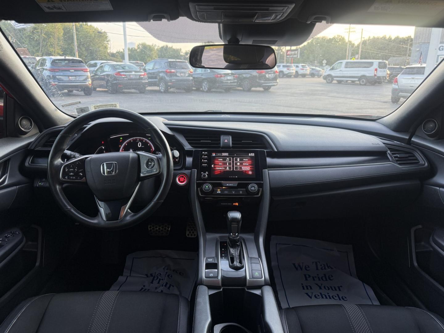 2021 Red /Black Honda Civic Sport Hatchback CVT (SHHFK7H42MU) with an 1.5L I4 16V DOHC TURBO engine, Automatic transmission, located at 547 E. Main St., Orwell, OH, 44076, (440) 437-5893, 41.535435, -80.847855 - 2021 Honda Civic Hatchback Sport – Efficient, Sporty, and Easy to Live With If you want a compact hatchback that feels current, efficient, and enjoyable to drive, this 2021 Honda Civic Hatchback Sport is a strong option. The 1.5L Turbocharged engine delivers responsive power and an impressive 40- Photo#16