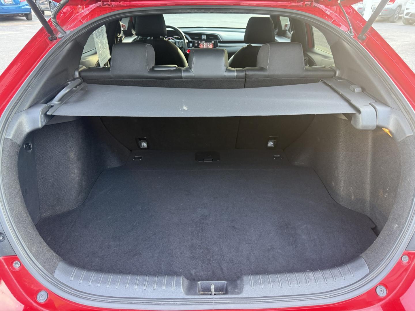 2021 Red /Black Honda Civic Sport Hatchback CVT (SHHFK7H42MU) with an 1.5L I4 16V DOHC TURBO engine, Automatic transmission, located at 547 E. Main St., Orwell, OH, 44076, (440) 437-5893, 41.535435, -80.847855 - 2021 Honda Civic Hatchback Sport – Efficient, Sporty, and Easy to Live With If you want a compact hatchback that feels current, efficient, and enjoyable to drive, this 2021 Honda Civic Hatchback Sport is a strong option. The 1.5L Turbocharged engine delivers responsive power and an impressive 40- Photo#30