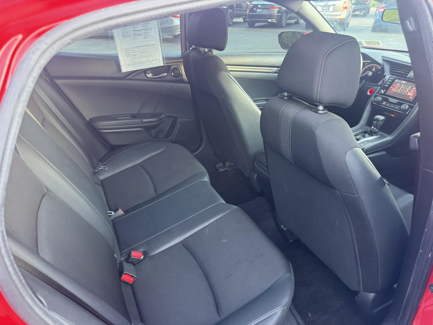 2021 Red /Black Honda Civic Sport Hatchback CVT (SHHFK7H42MU) with an 1.5L I4 16V DOHC TURBO engine, Automatic transmission, located at 547 E. Main St., Orwell, OH, 44076, (440) 437-5893, 41.535435, -80.847855 - 2021 Honda Civic Hatchback Sport – Efficient, Sporty, and Easy to Live With If you want a compact hatchback that feels current, efficient, and enjoyable to drive, this 2021 Honda Civic Hatchback Sport is a strong option. The 1.5L Turbocharged engine delivers responsive power and an impressive 40- Photo#31